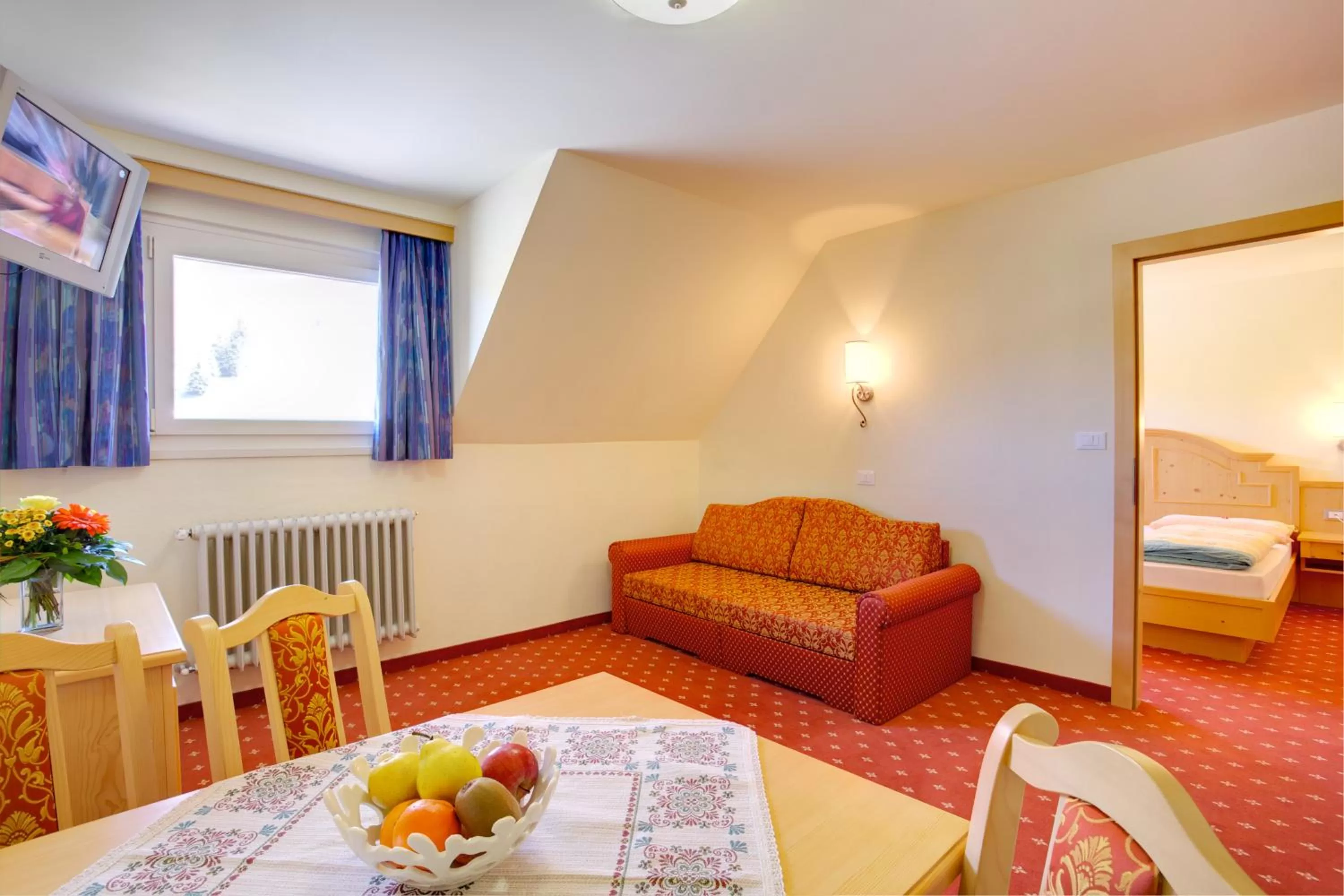 Living room, Bed in Hotel Castel Latemar
