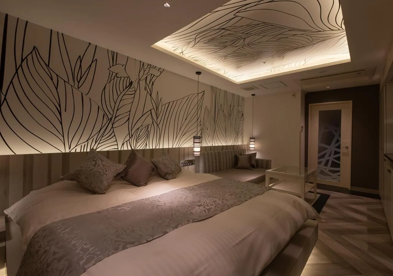 Bed in HOTEL U's Kouroen