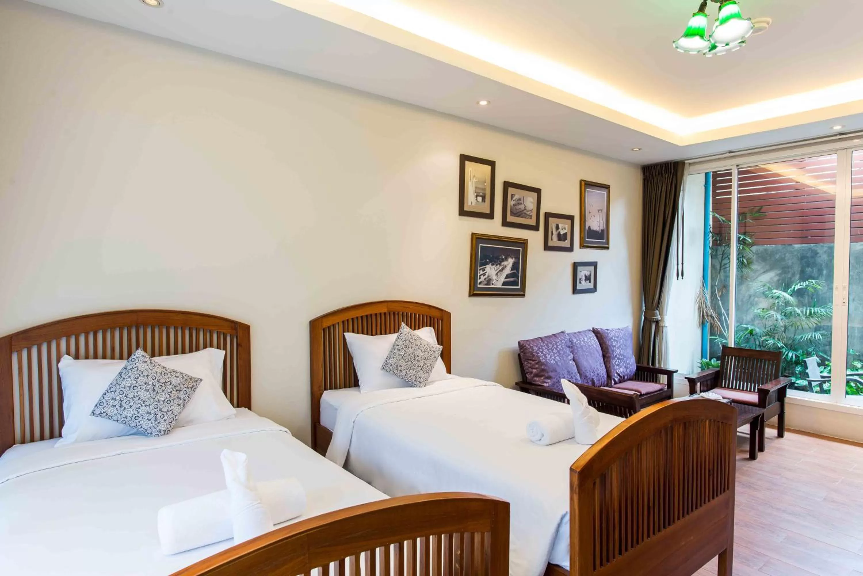 Bed in Feung Nakorn Balcony Rooms and Cafe