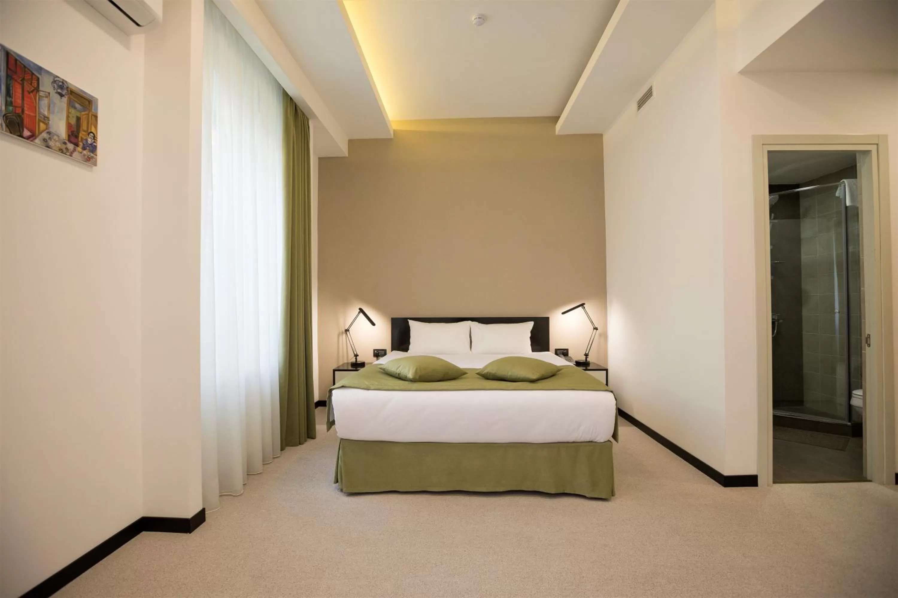 Bed in AnnaBella Boutique Hotel