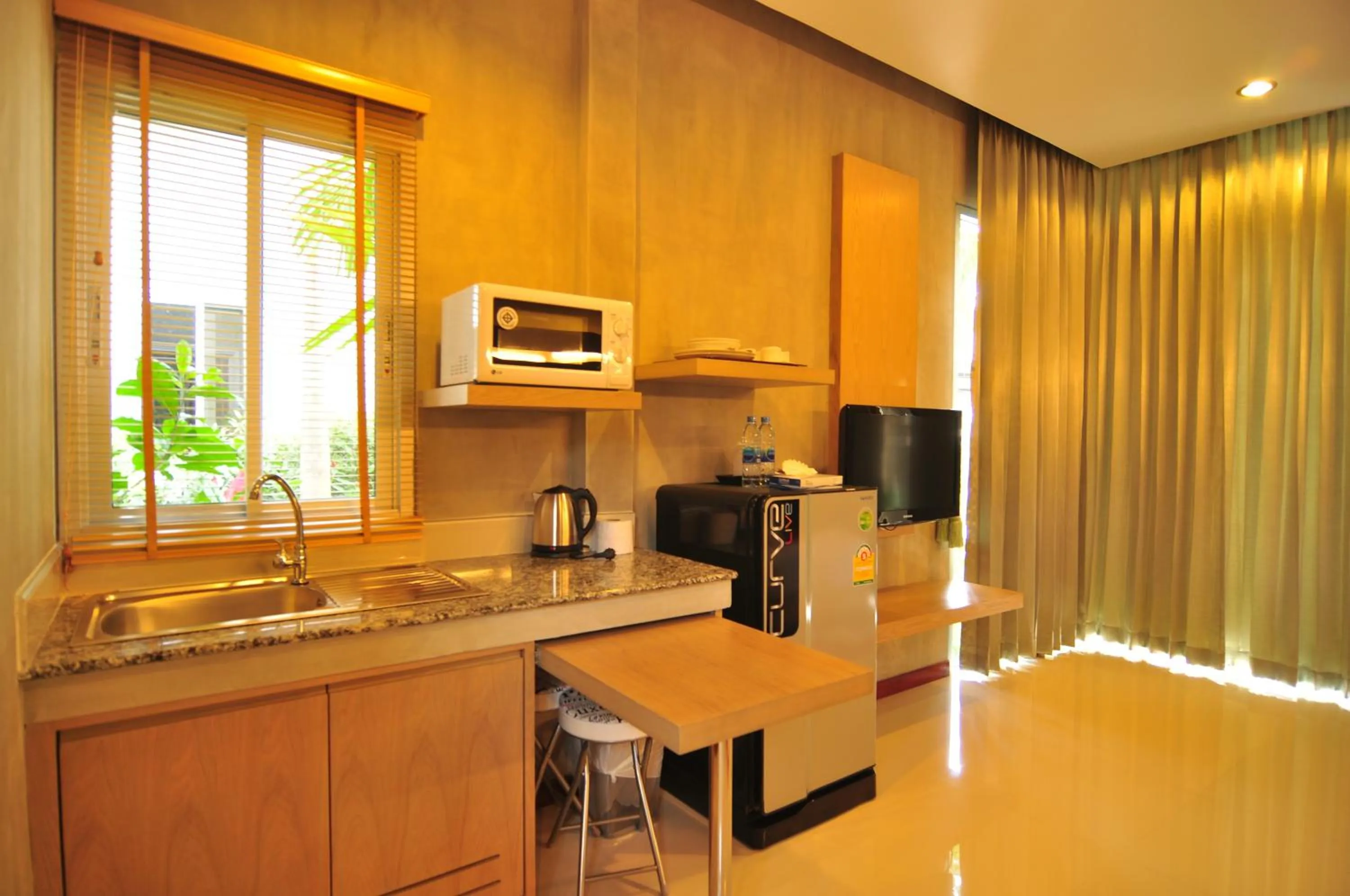 Kitchen or kitchenette in Phu NaNa Boutique Hotel - SHA Plus