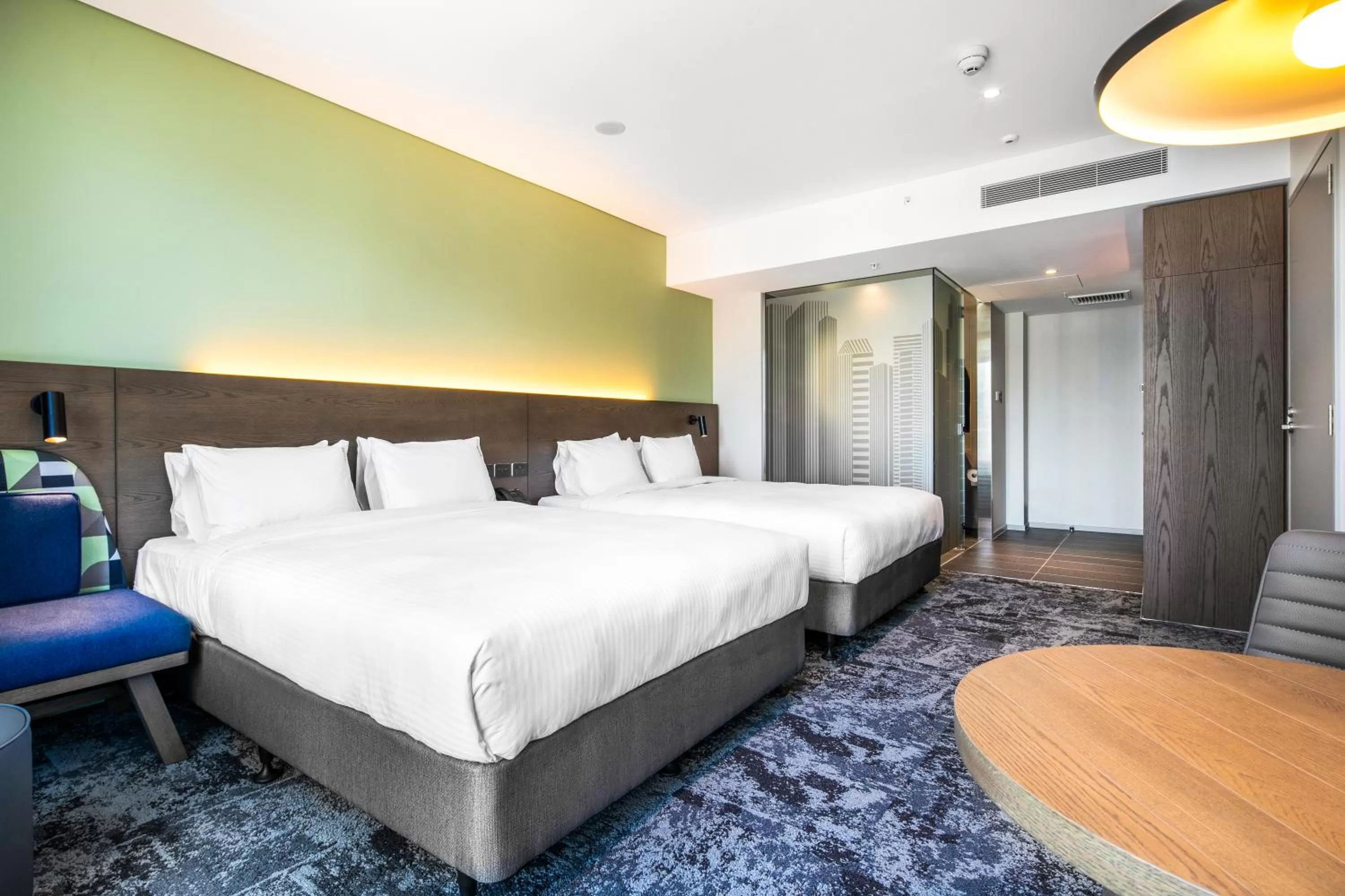 Bed in Holiday Inn Express Melbourne Little Collins by IHG