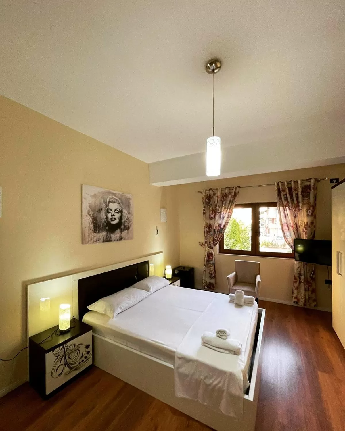 Bed in Hotel Ambasador Garden