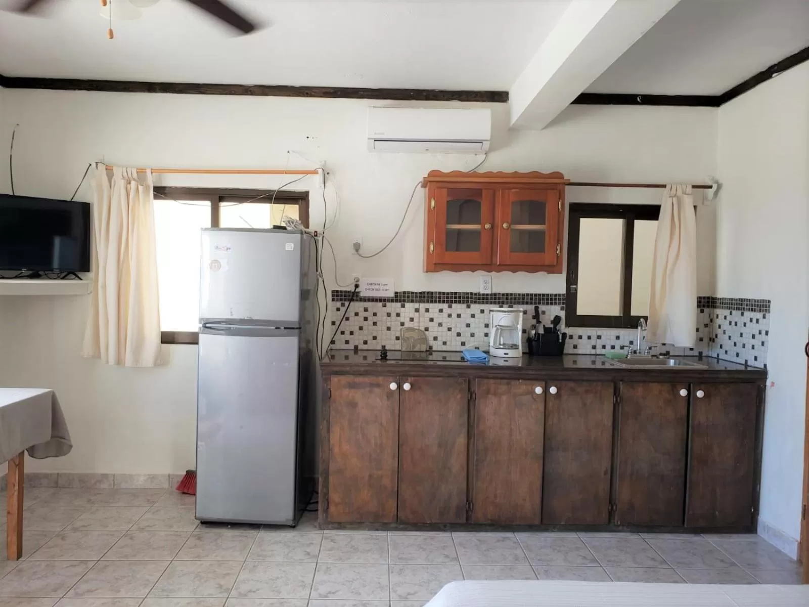 Kitchen/Kitchenette in Beach Side Condos Caye Caulker by CCVH