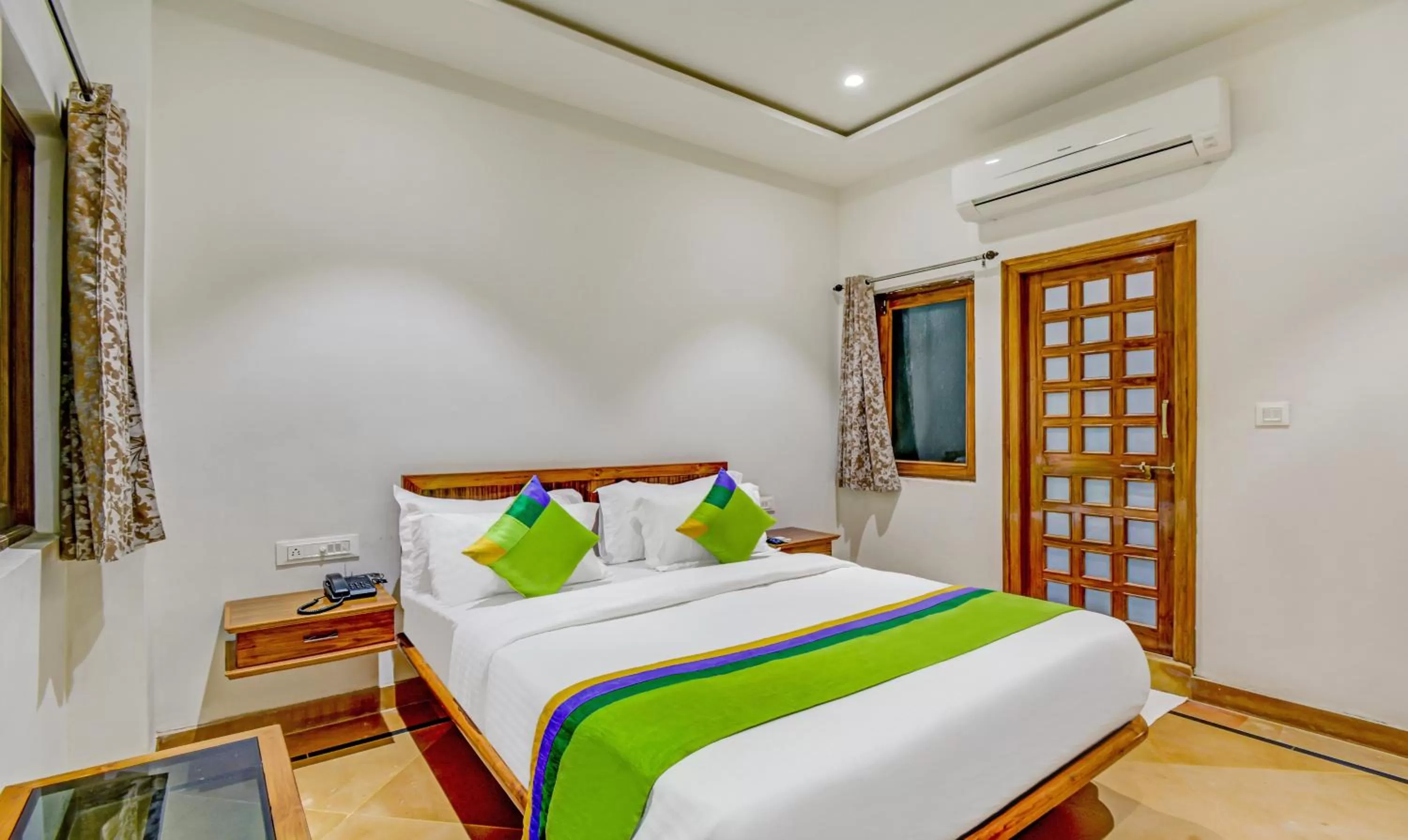 Bed in Treebo Trend Chandrangan Excellency