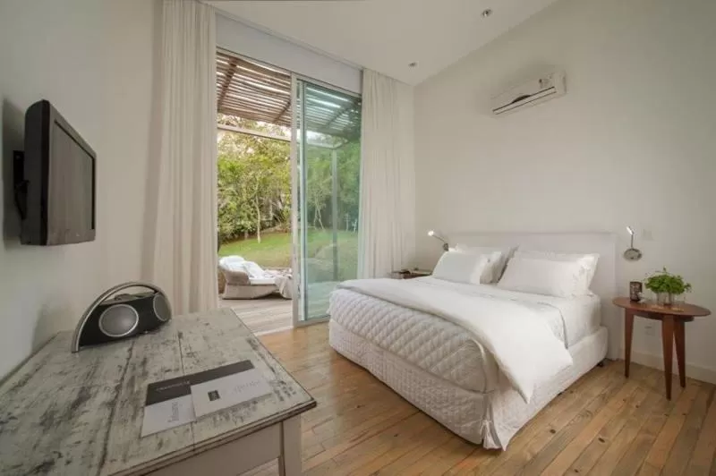 Bed in Felissimo Exclusive Hotel