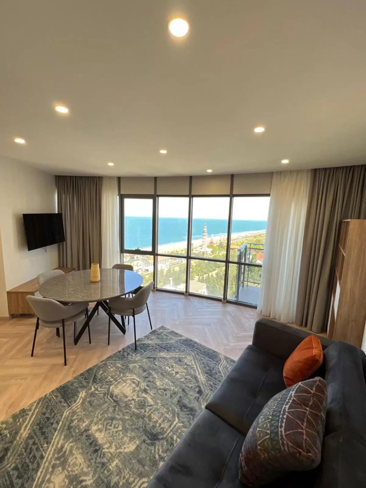 Bed, Seating Area in Aparthotel Holiday Lux Batumi