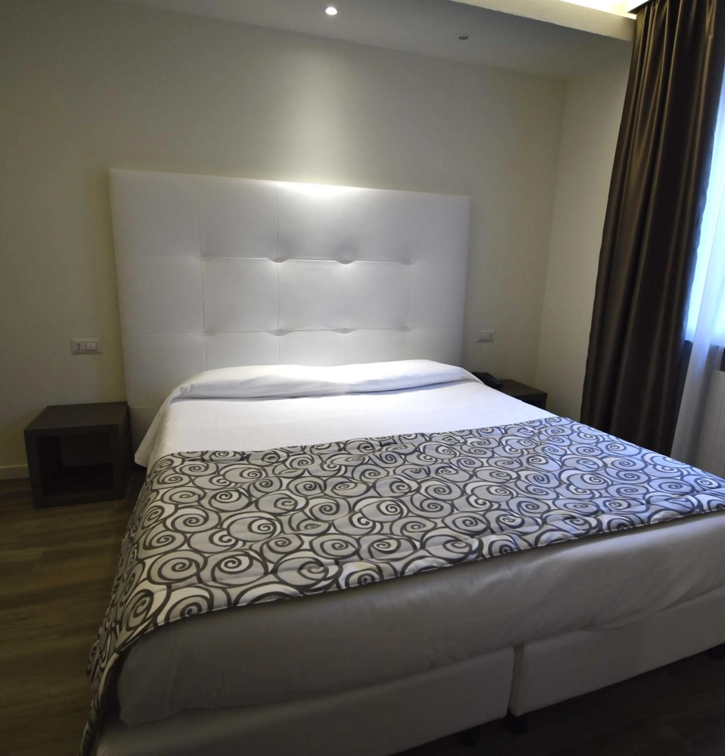 Bed in Hotel Riposo