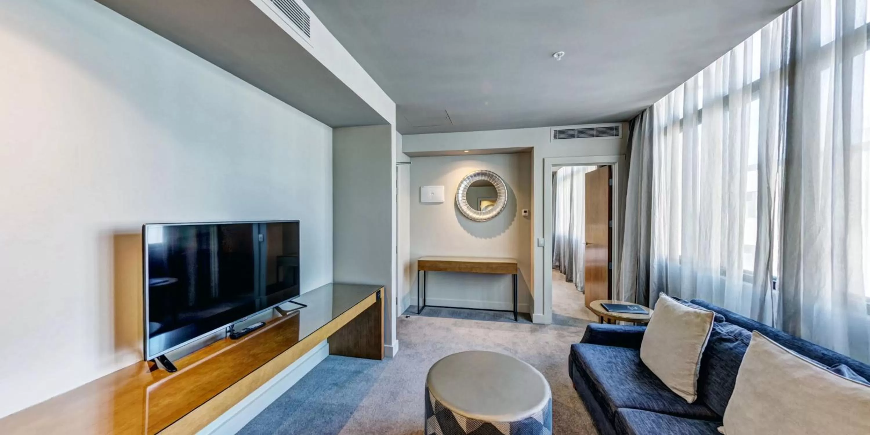 Living room in Distinction Dunedin Hotel