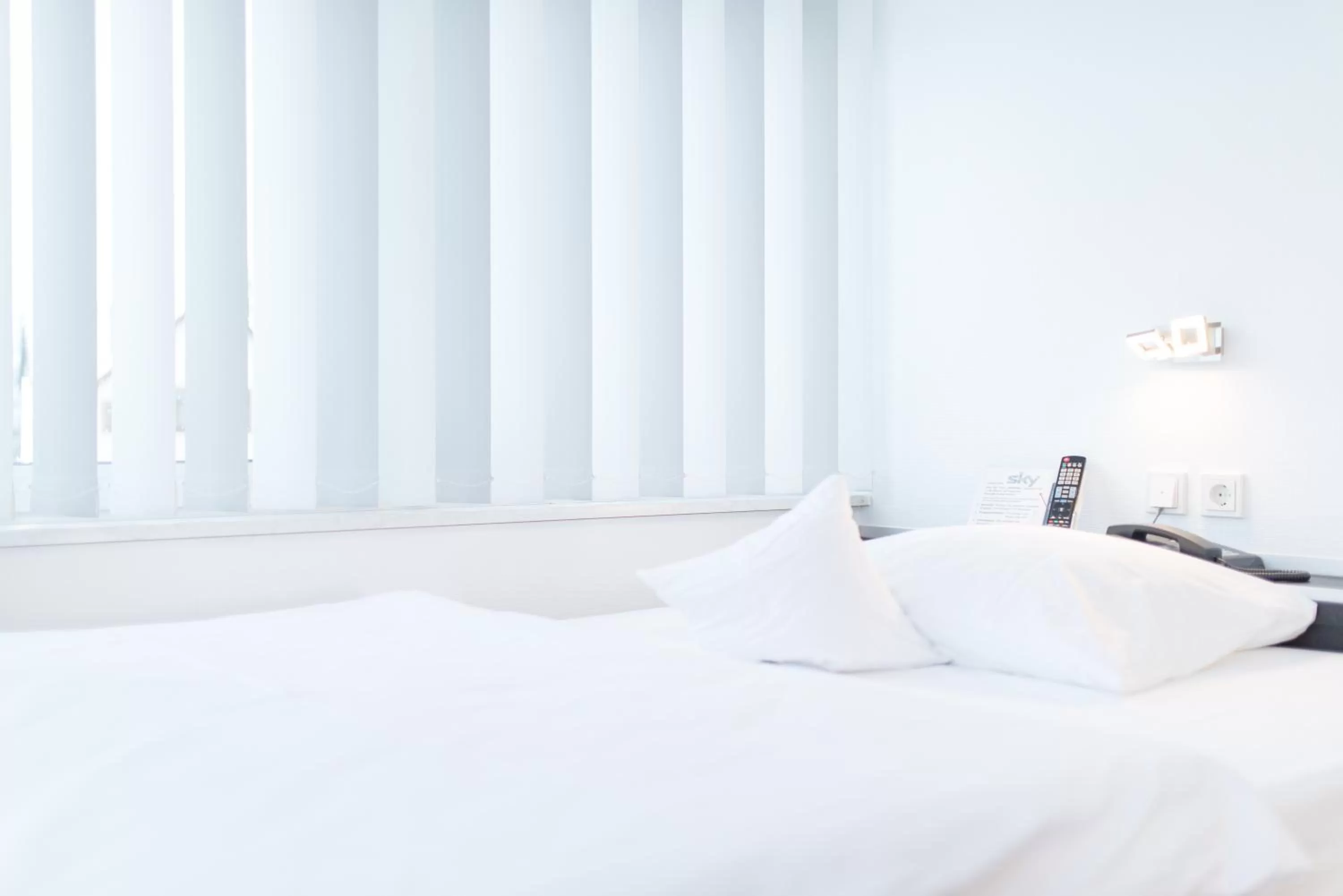 Bed in Hotel Am Triller - Hotel & Serviced Apartments