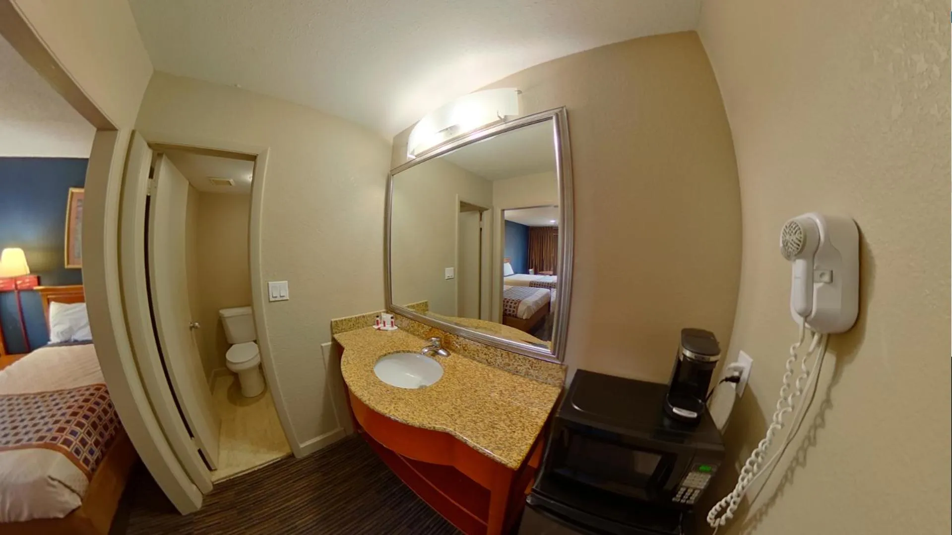 Bed in Travelodge by Wyndham Williamsburg Colonial Area