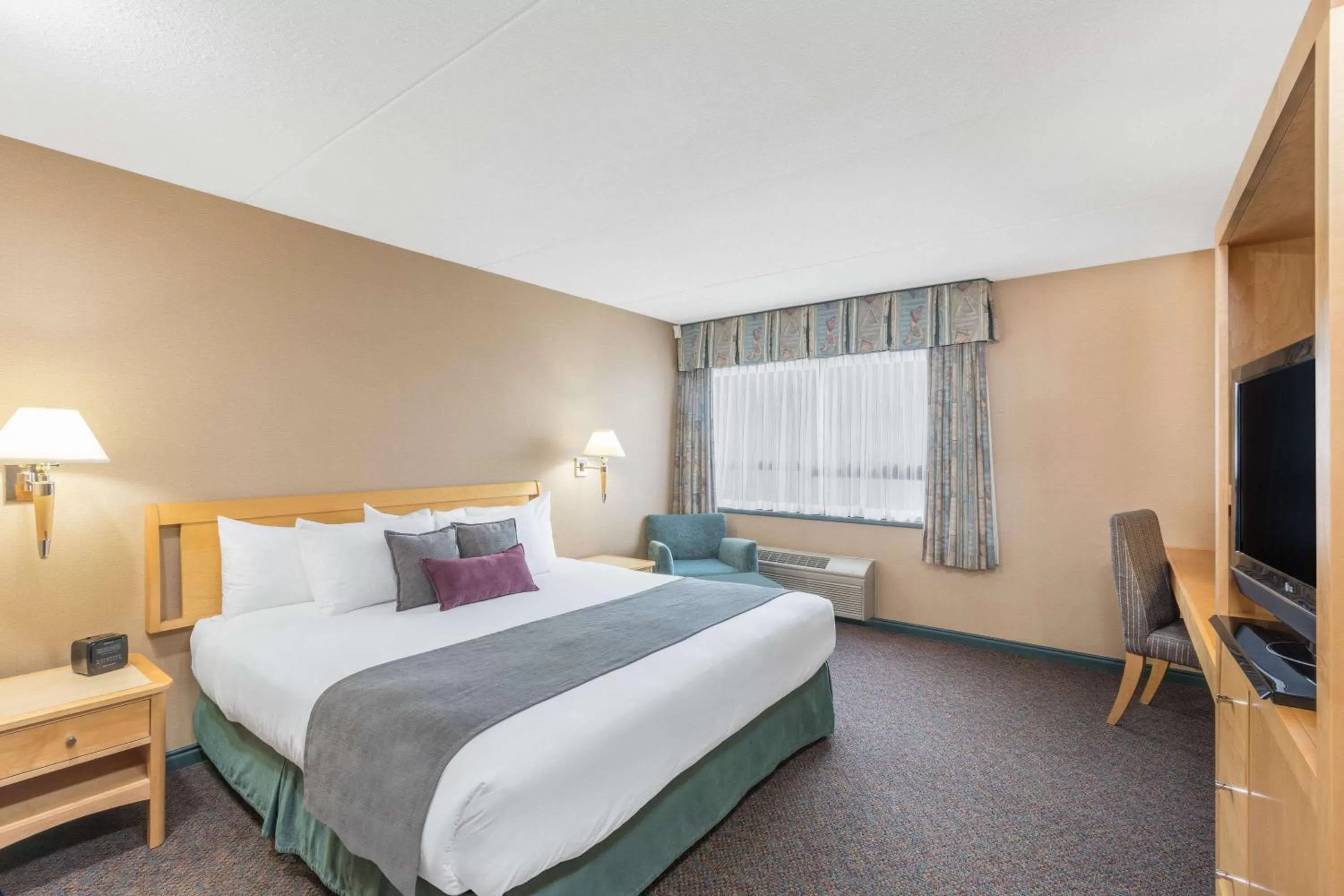 Photo of the whole room, Bed in Ramada Plaza by Wyndham Prince George