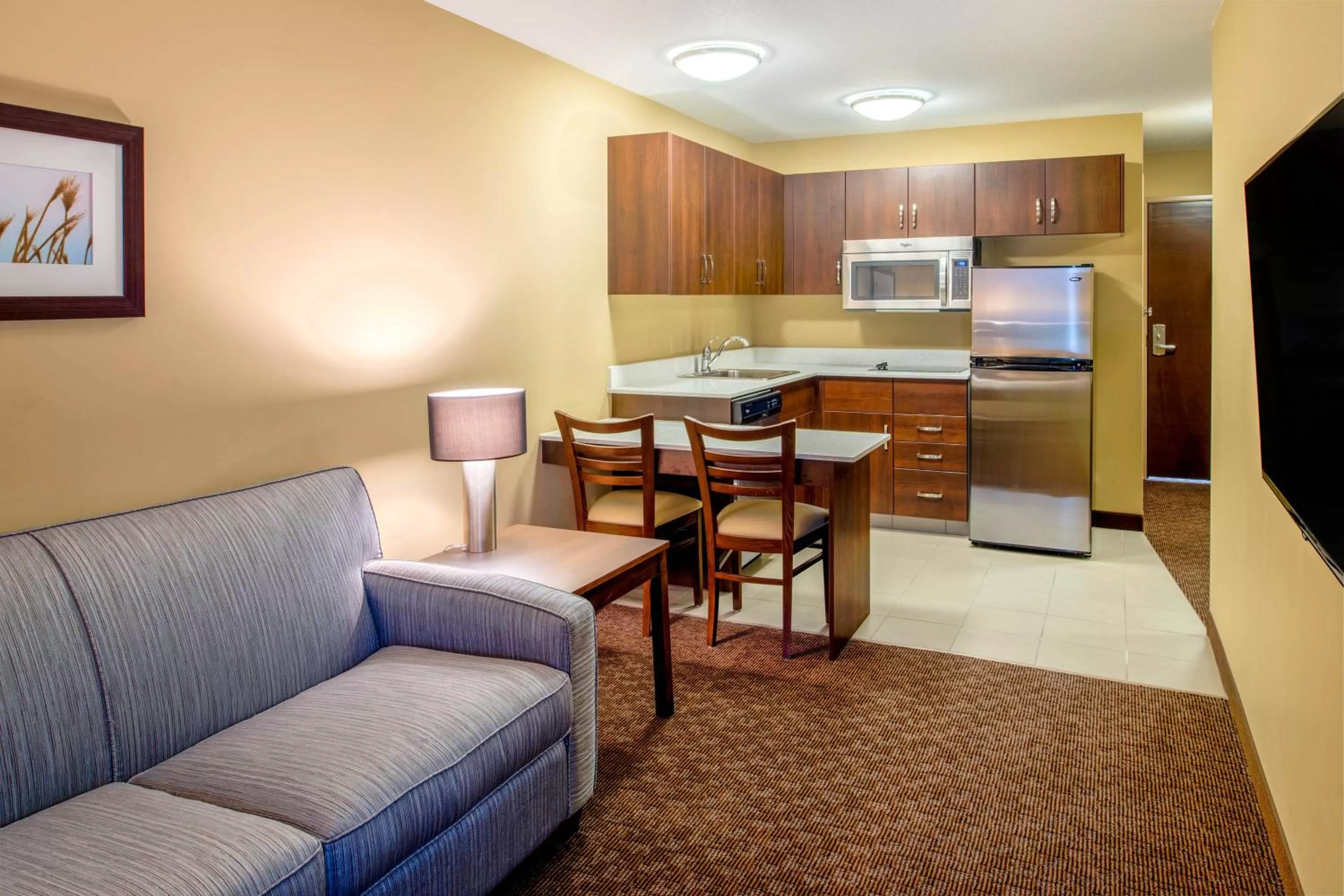 Kitchen or kitchenette in Microtel Inn & Suites by Wyndham Red Deer