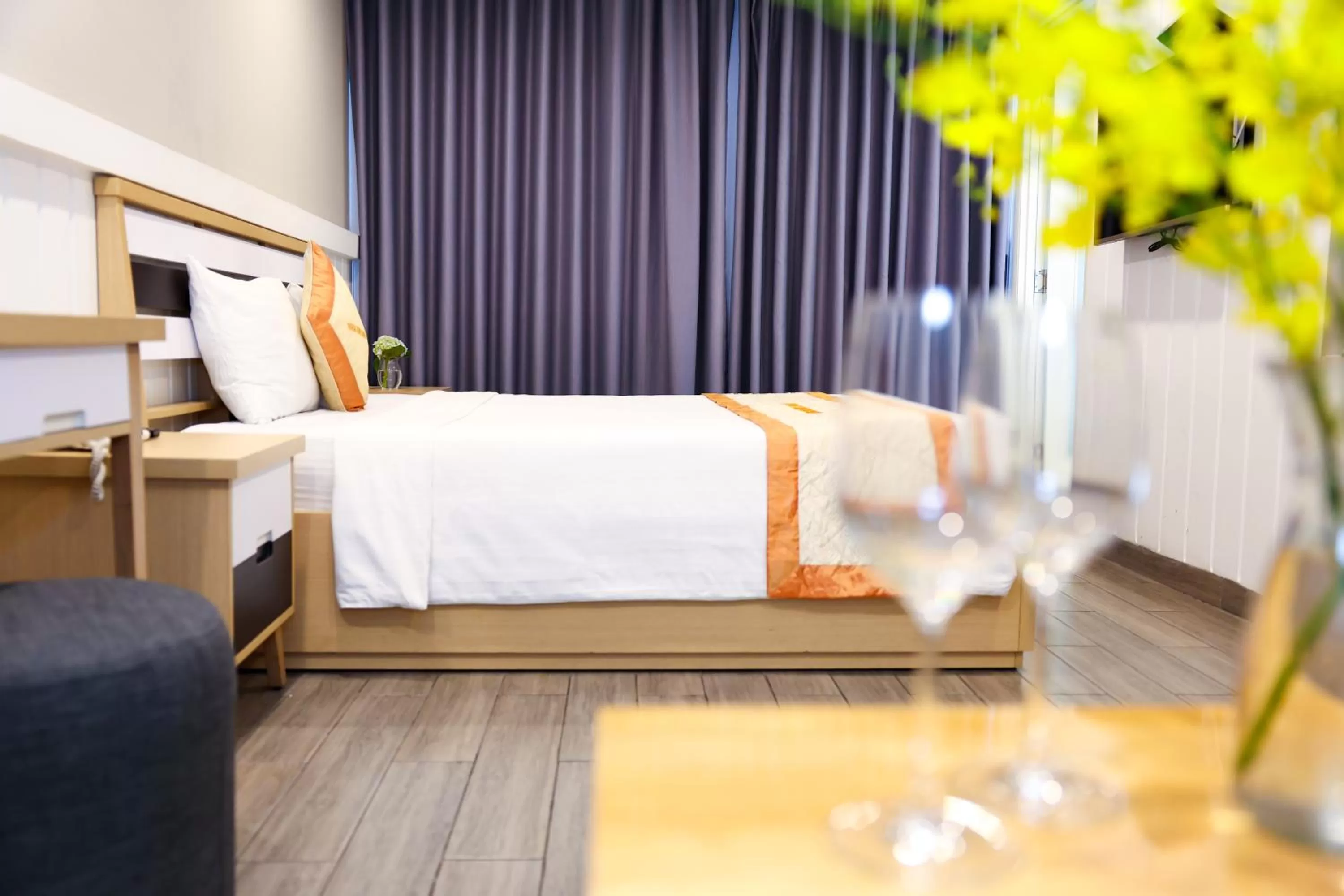 Bed in Warm Ways Hotel & Serviced Apartments