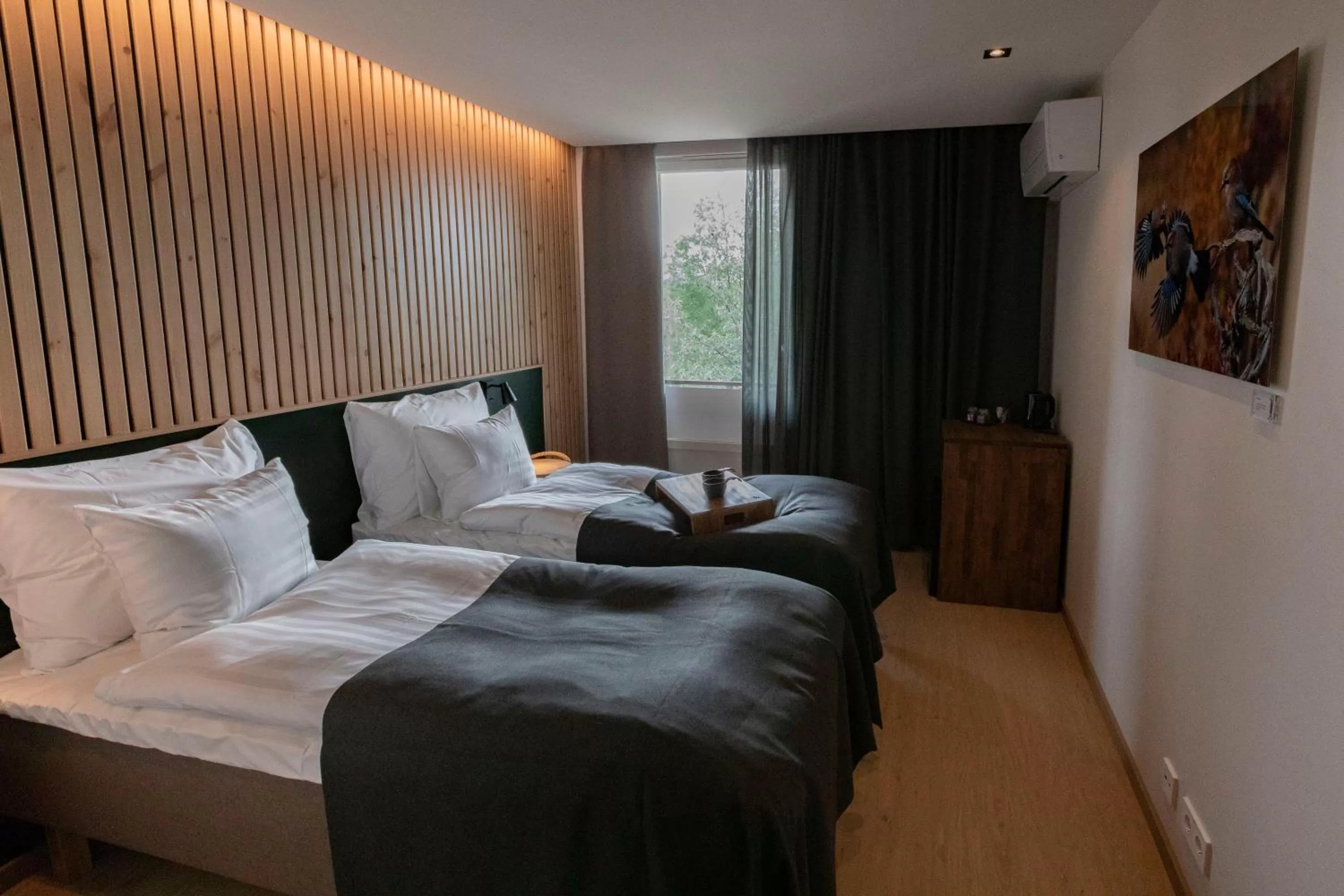 Bed in Haltia Lake Lodge nature boutique hotel & glamping