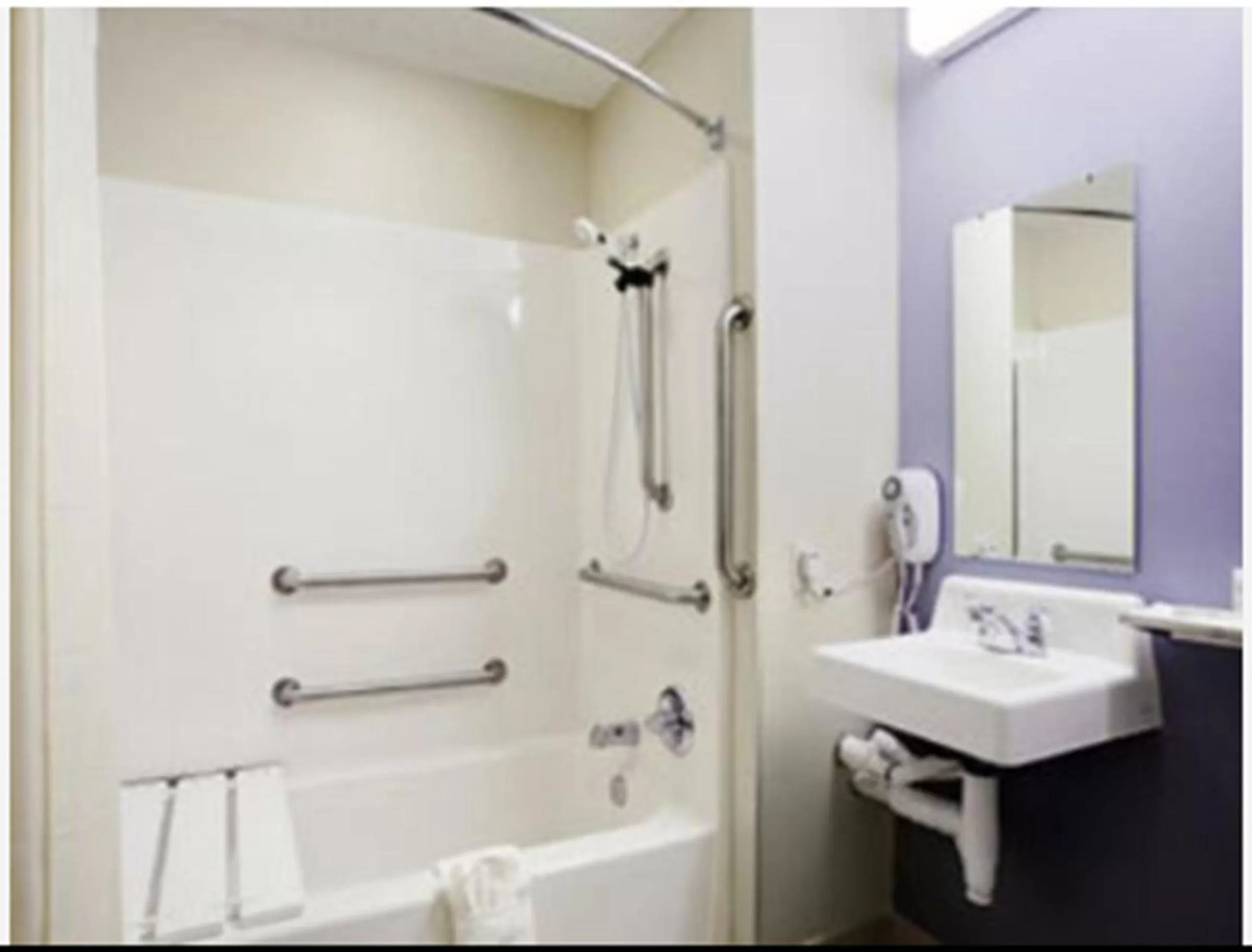 Shower in Microtel Inn & Suites by Wyndham Ozark