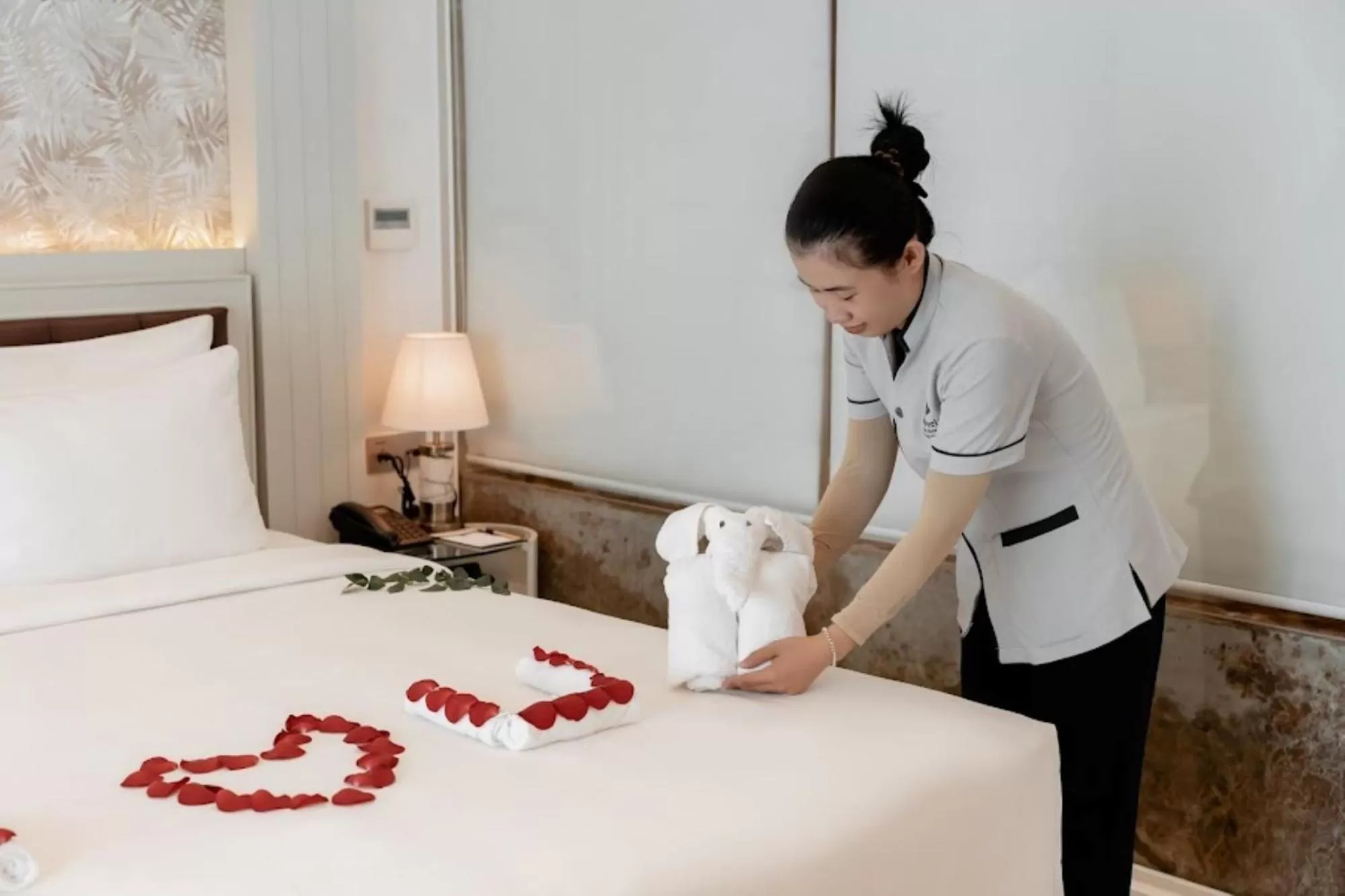 Bed in MerPerle Beach Hotel