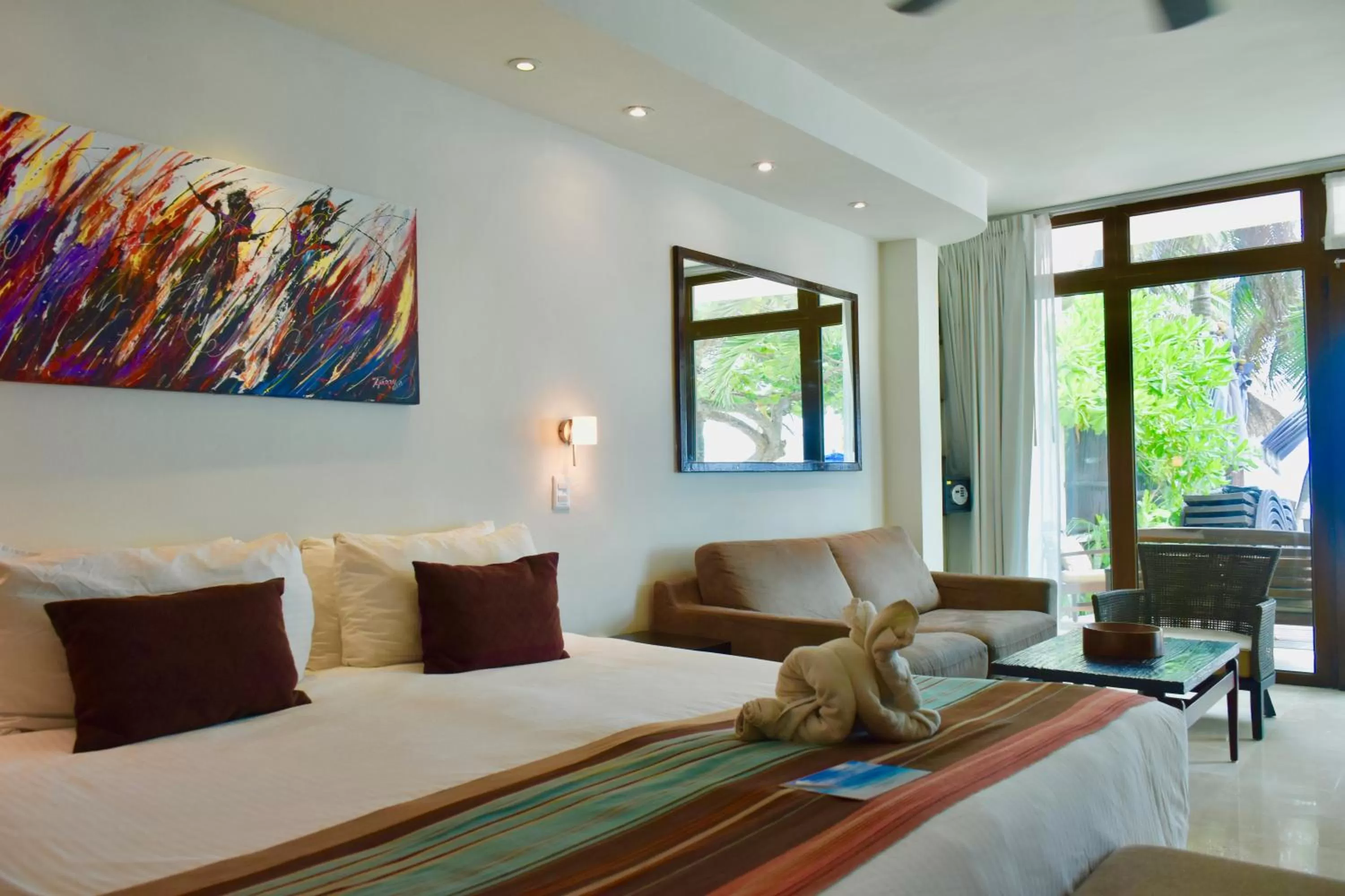 Bed in Playa Palms Beach Hotel