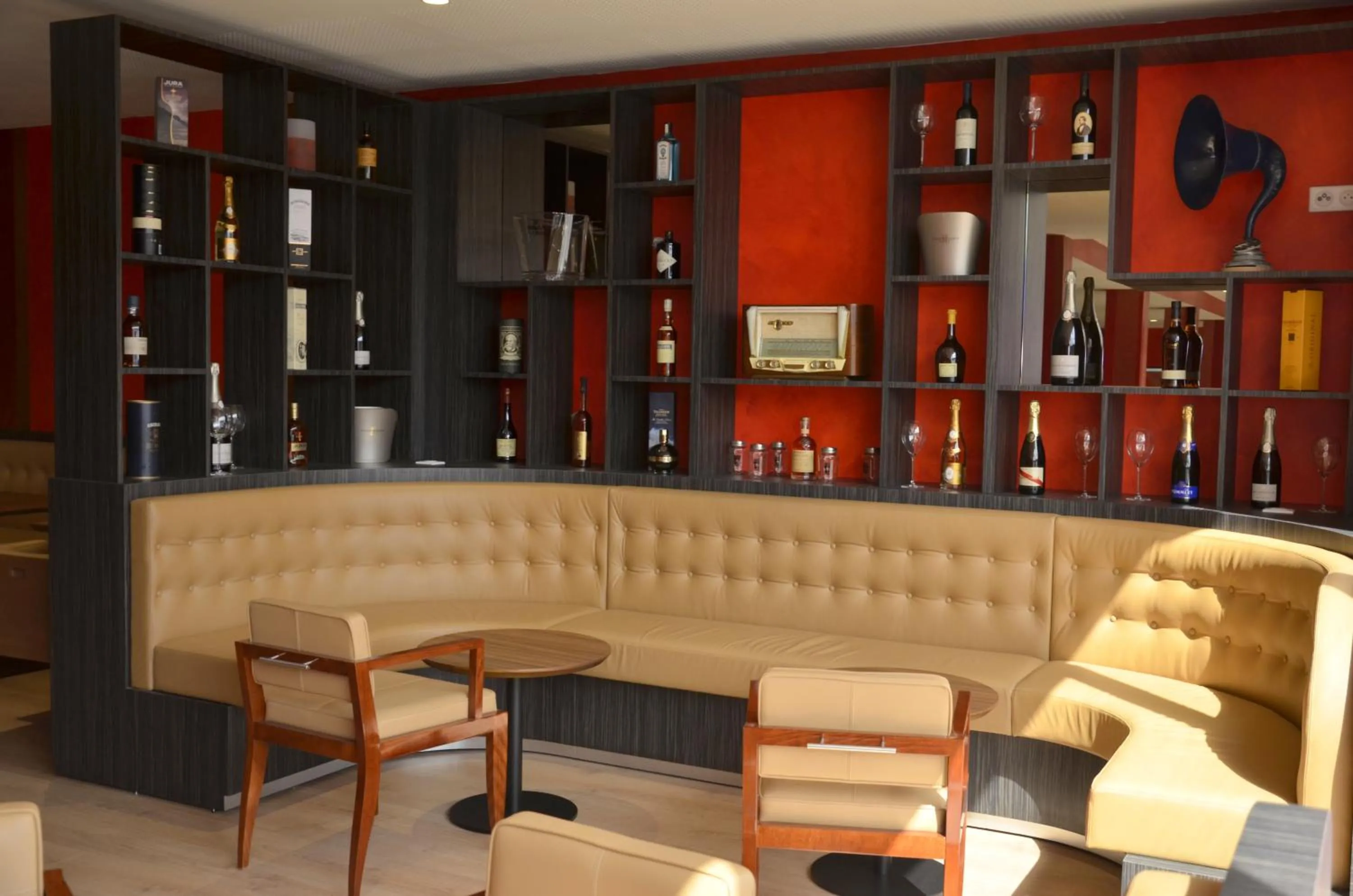 Communal lounge/ TV room in Le Grand Hotel