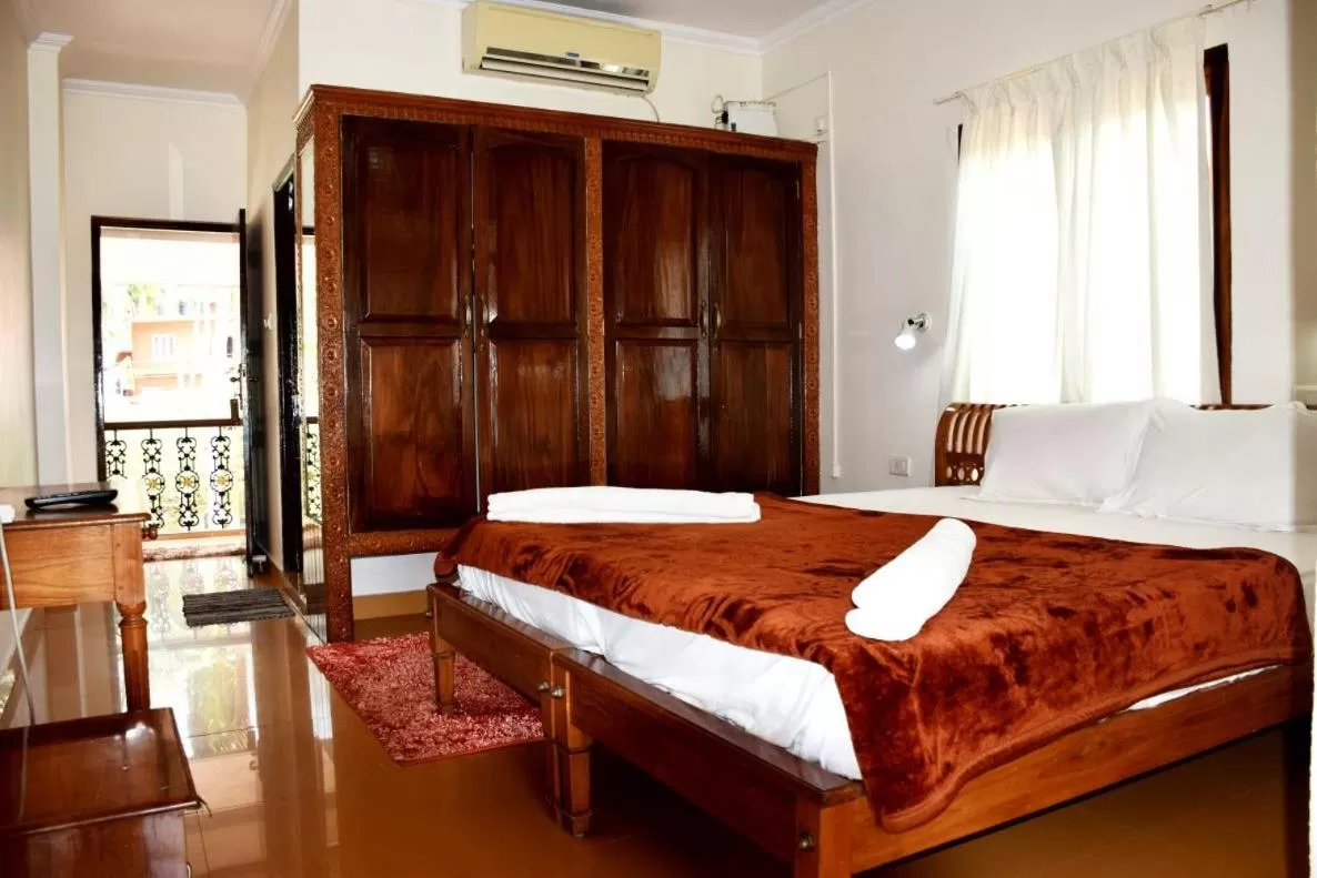 Bed in Vijaya Varma Beach Resort