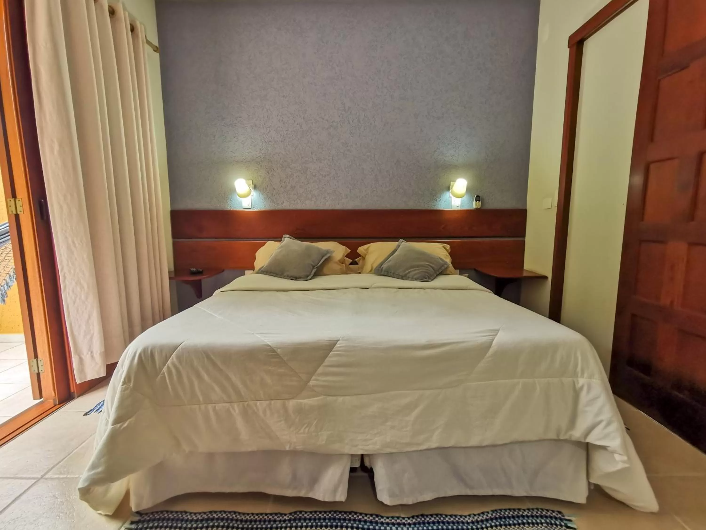 Bed in Pousada Ilha dos Anjos