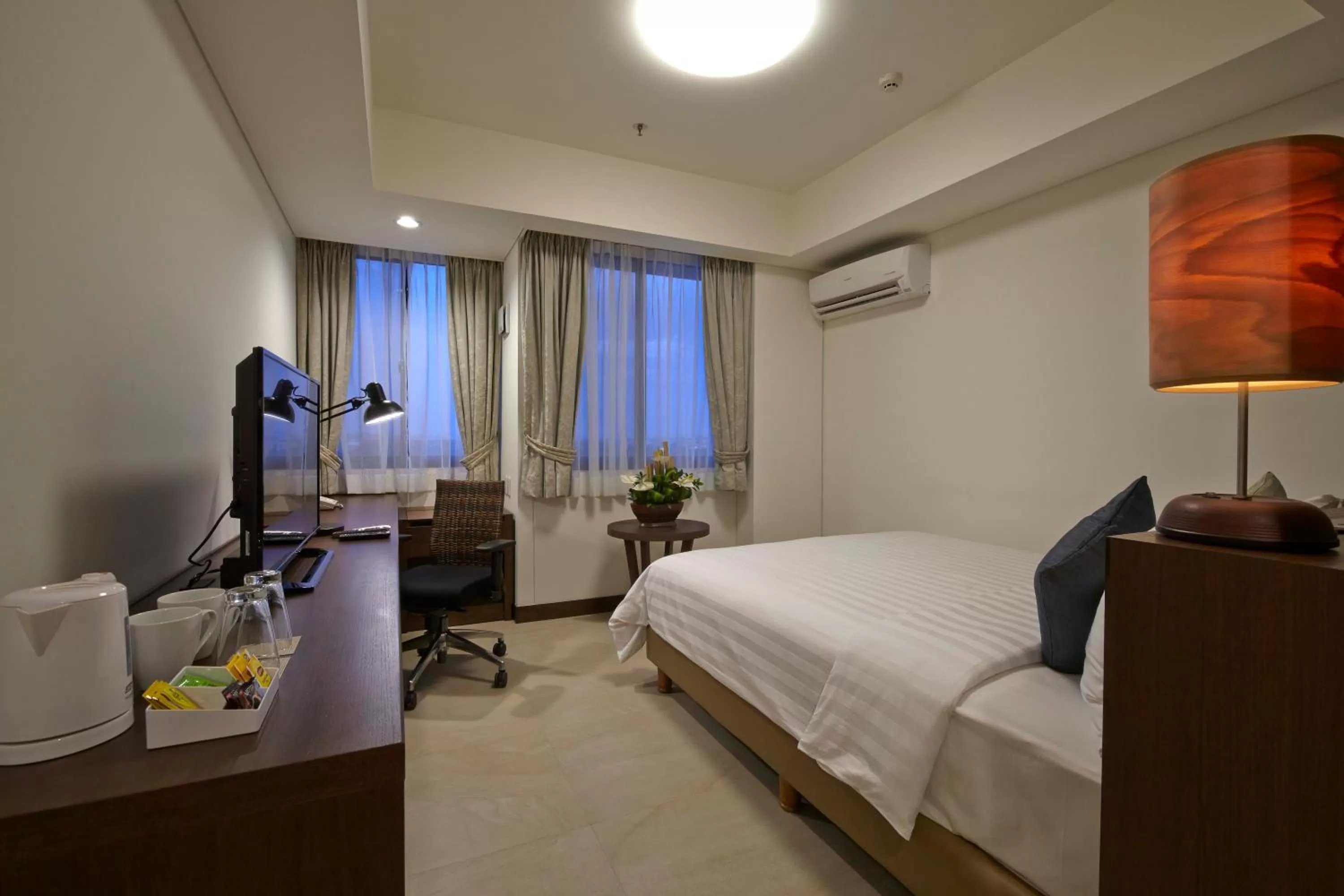 Photo of the whole room, Bed in Axia South Cikarang Service Apartment