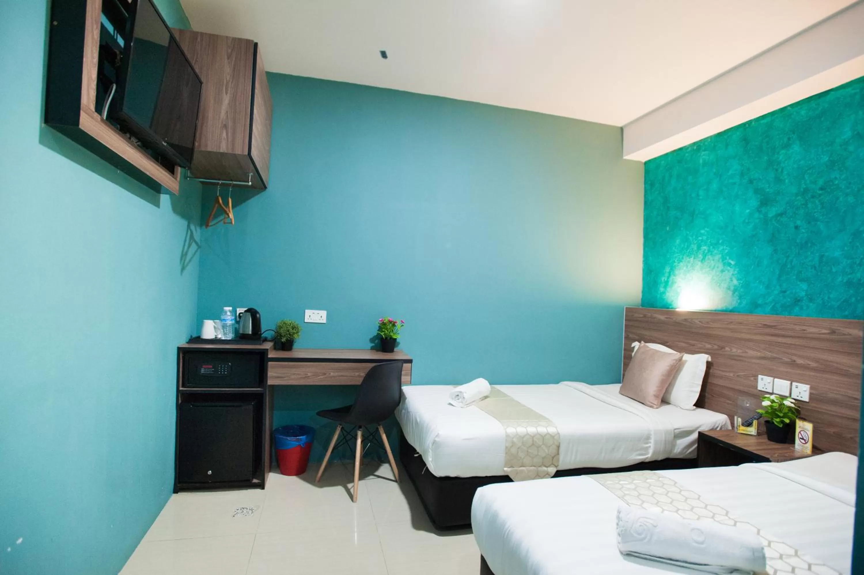 Bed in DJ Citi Point Hotel