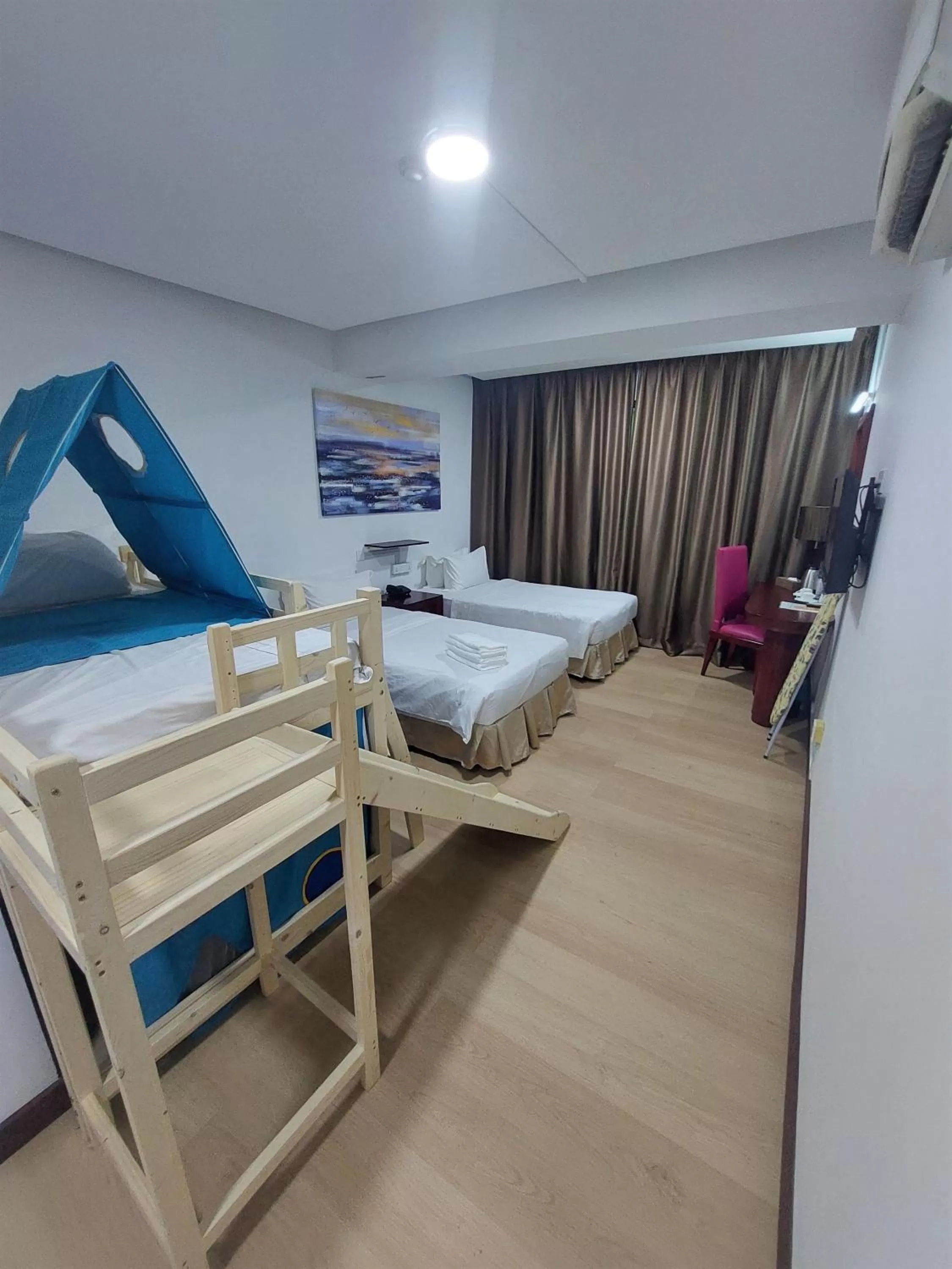 Bed in Celyn City Hotel