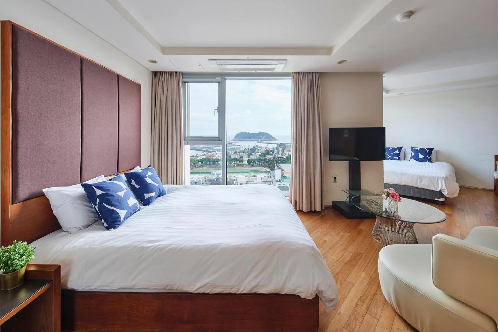 Bed in The Island Blue Hotel