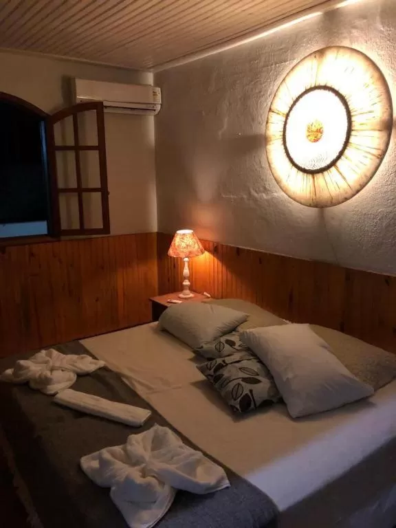 Bed in POUSADA CHARLOTTE