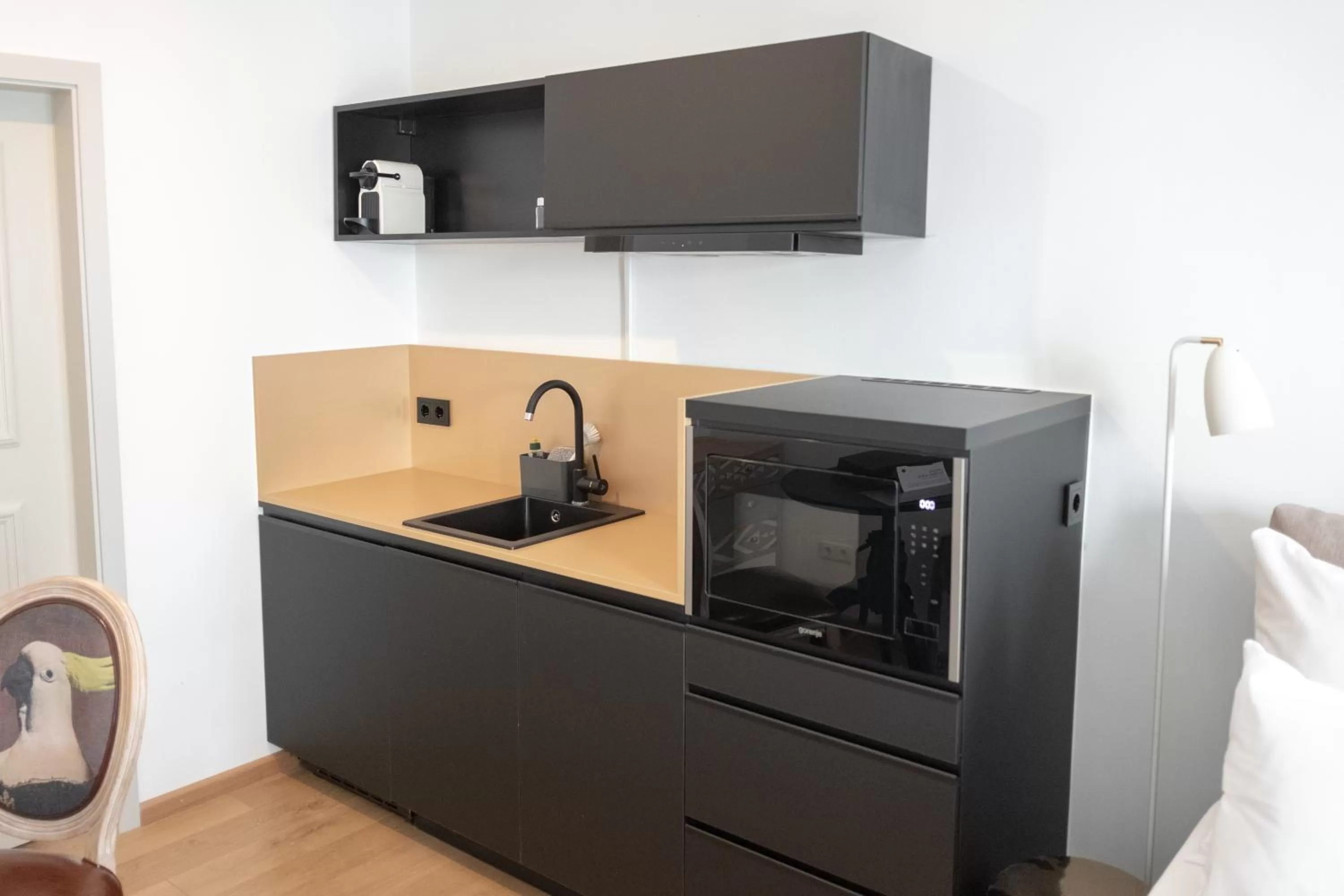 Kitchen or kitchenette in ANA Living Augsburg City Center by Arthotel ANA - Self-Service-Hotel