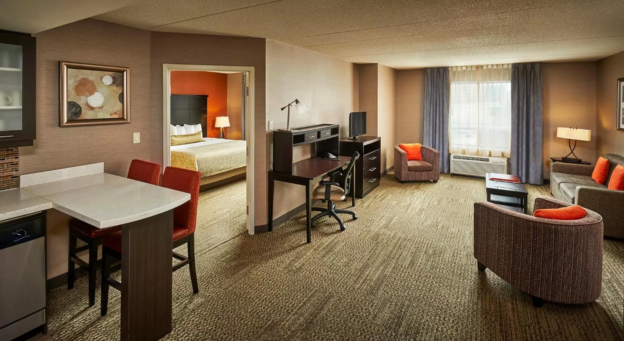 Living room, Bed in Staybridge Suites Hamilton - Downtown by IHG