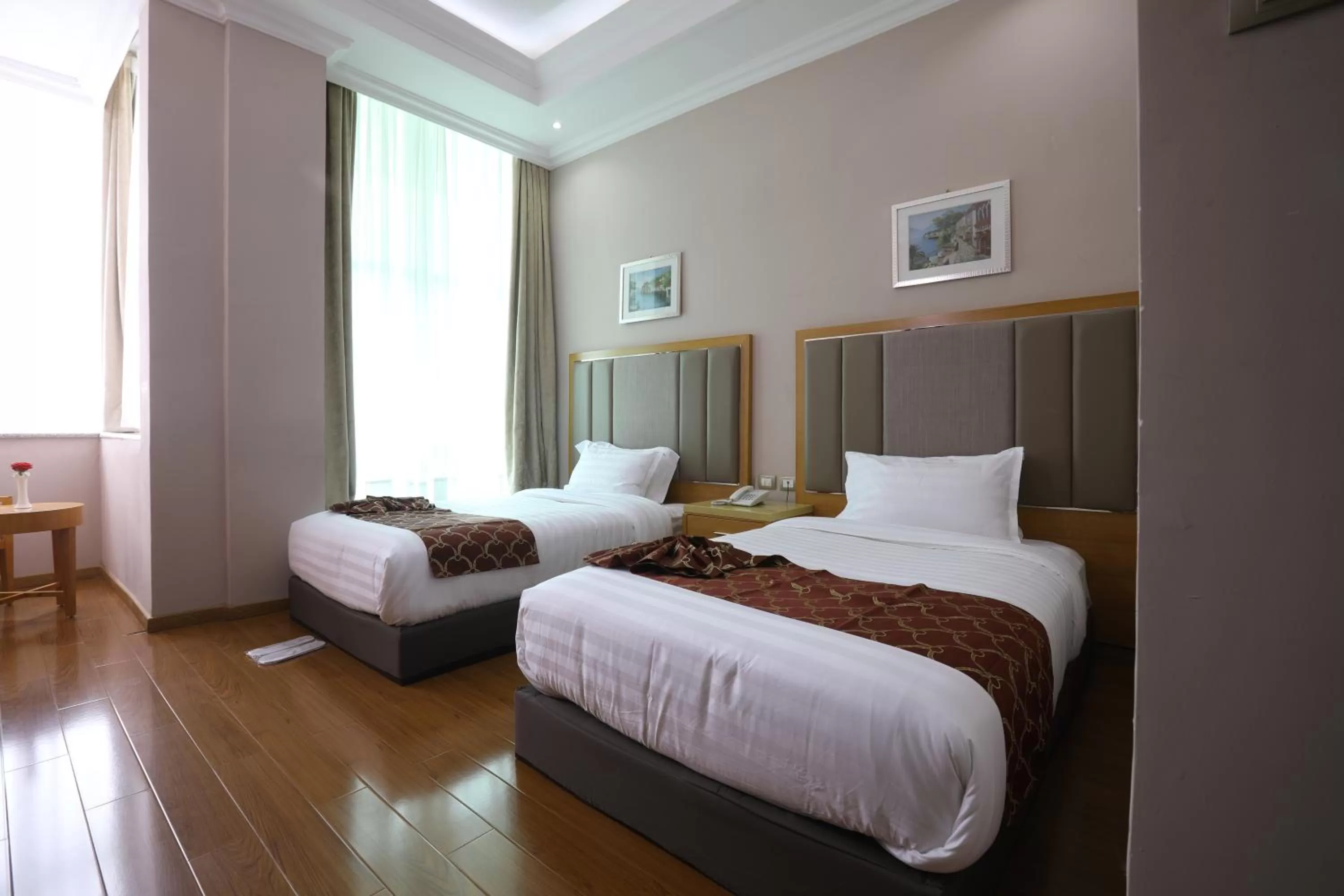 Bed in New Day Hotel