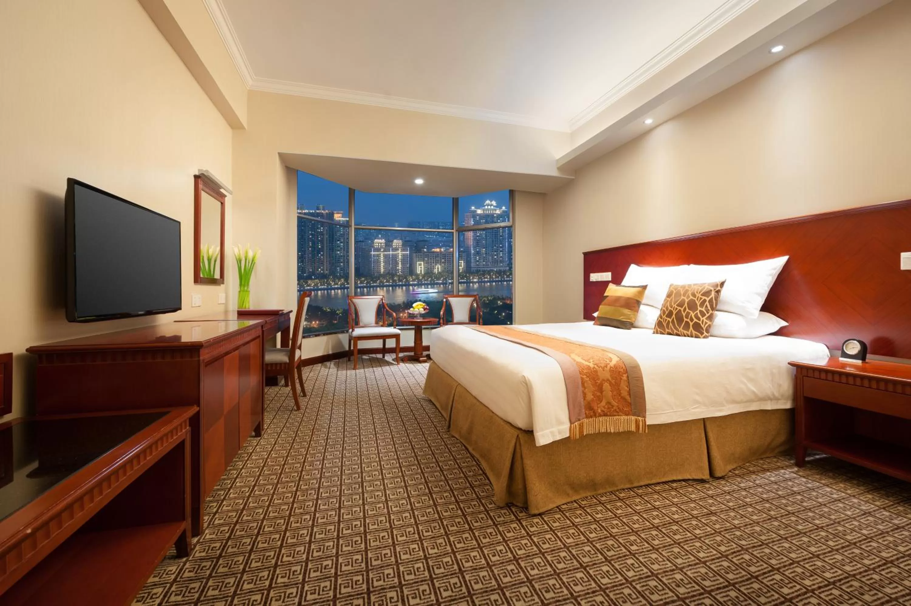 Photo of the whole room, Bed in Ramada by Wyndham Pearl Guangzhou-Canton Fair Free Shuttle Bus