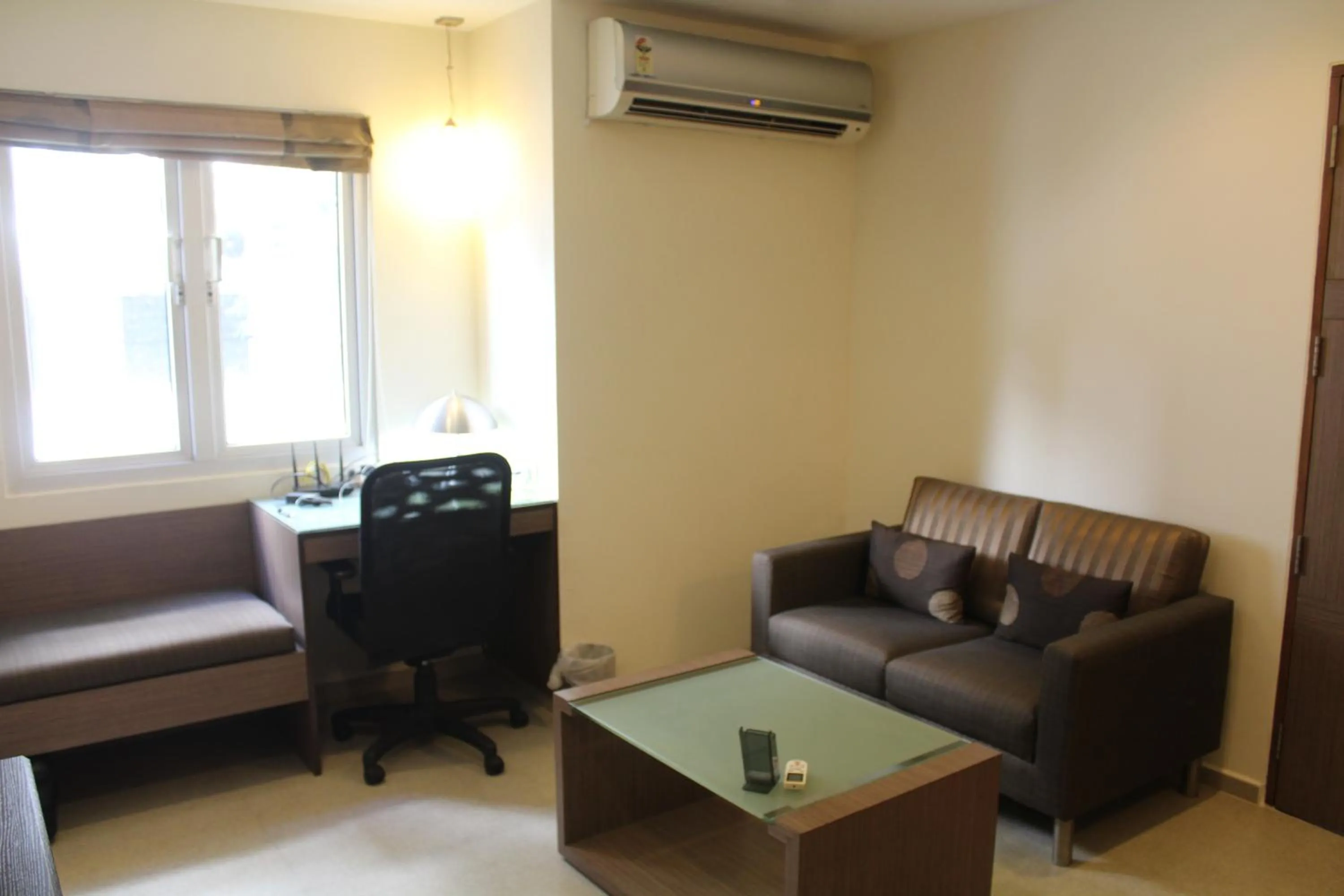 Living room in The Lotus Apartment Hotel, Venkatraman Street