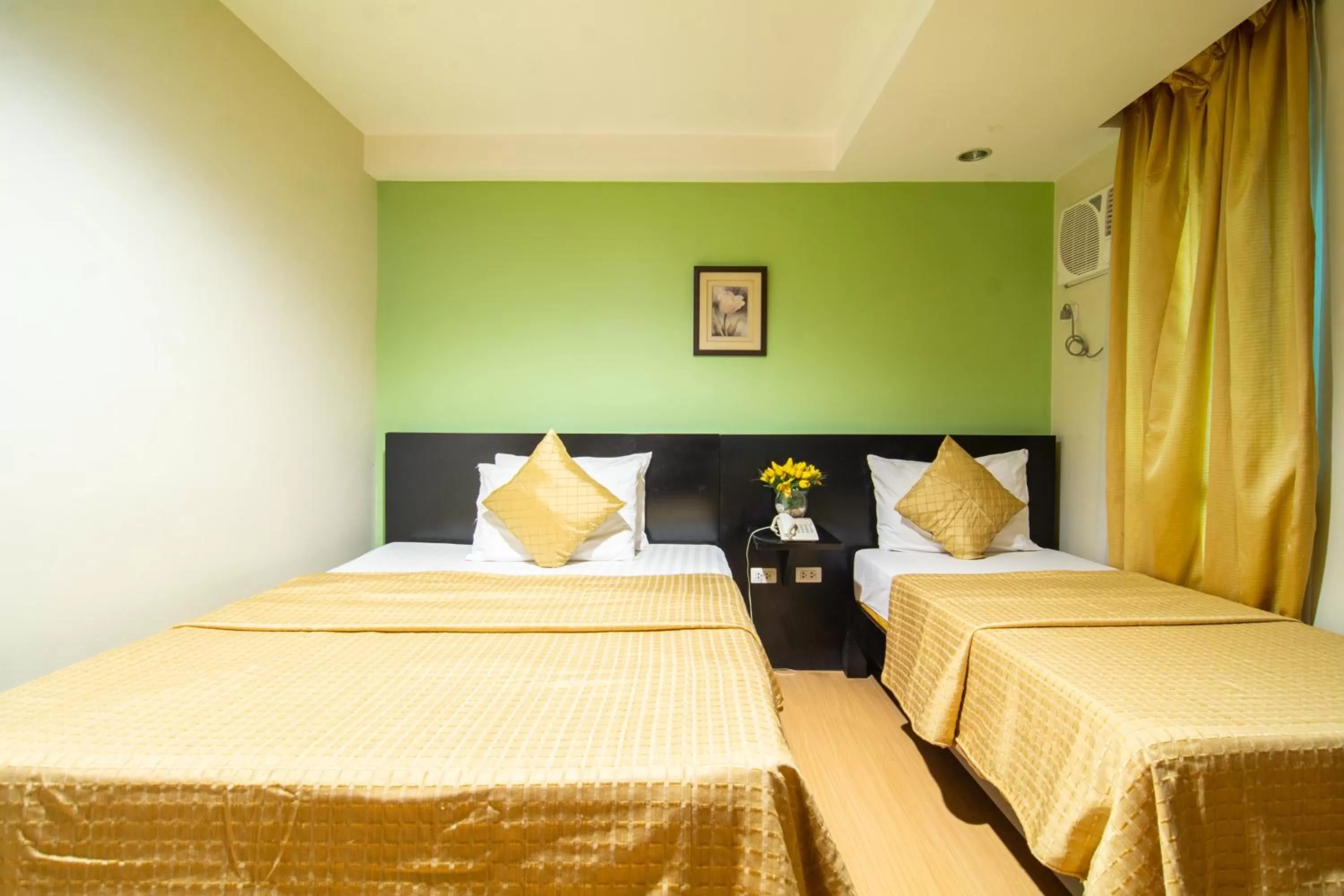 Bed in Festive Hotel Makati