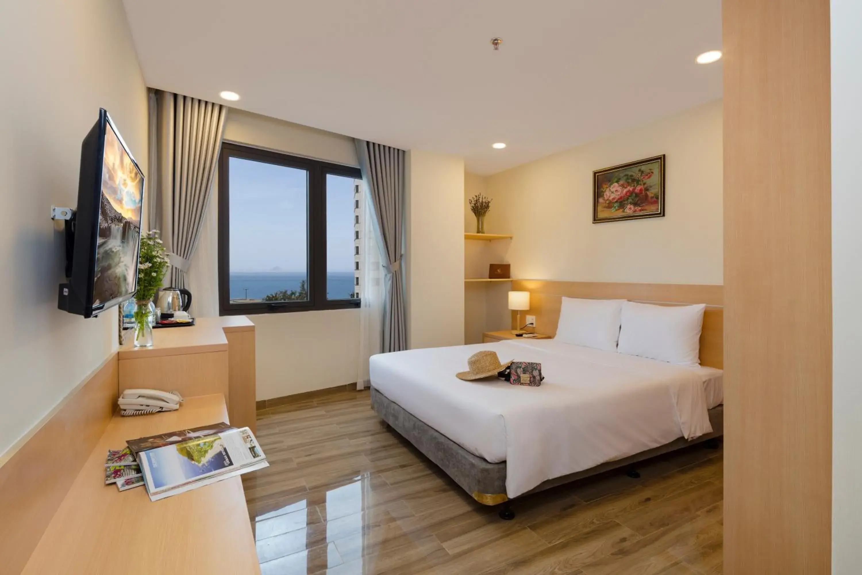 Deluxe Double Room with Side Sea View in The Swan Nha Trang Hotel Deluxe Double Room with Side Sea View in The Swan Nha Trang Hotel