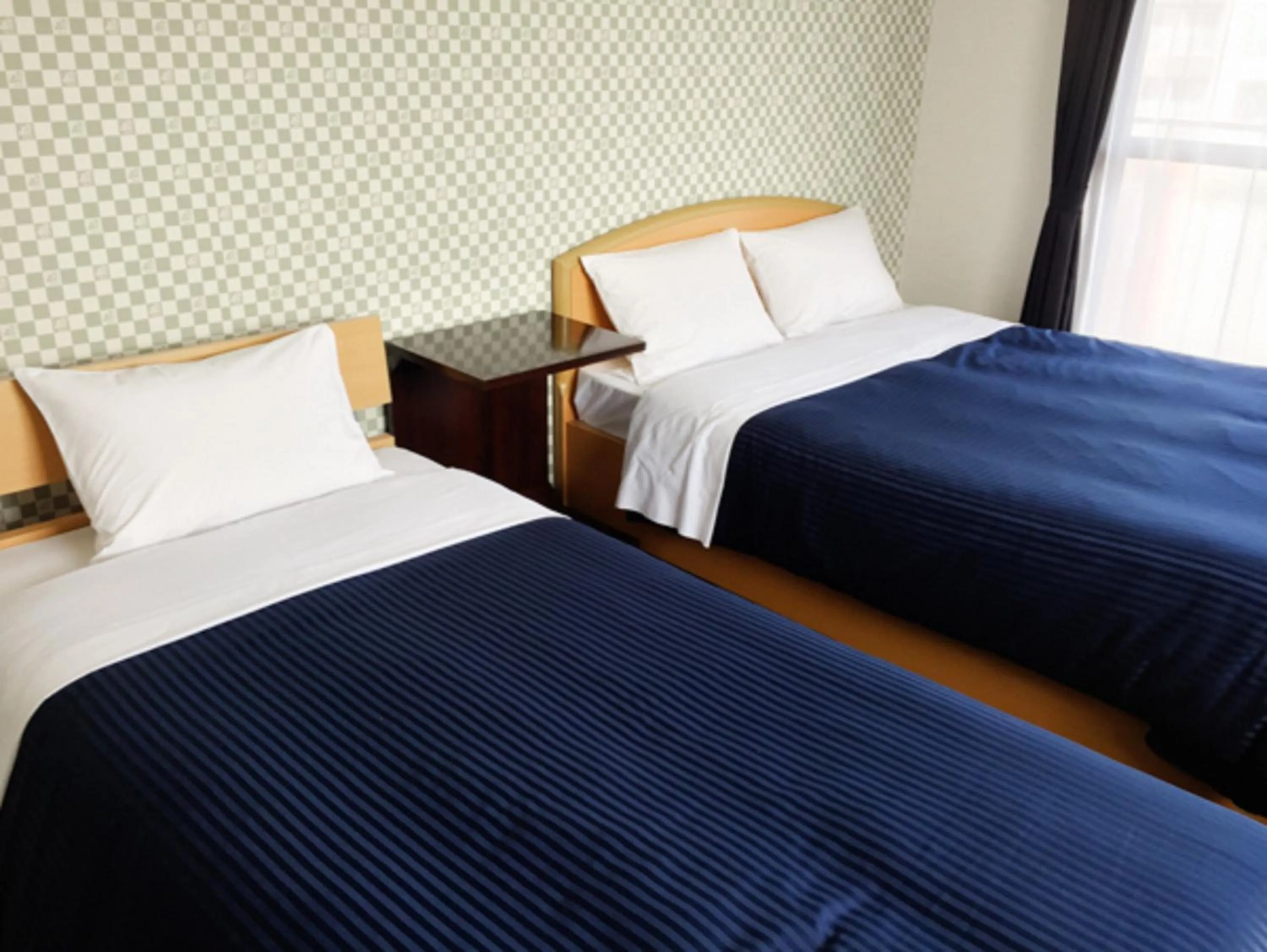 Bed in HOTEL LiVEMAX BUDGET Fuchu