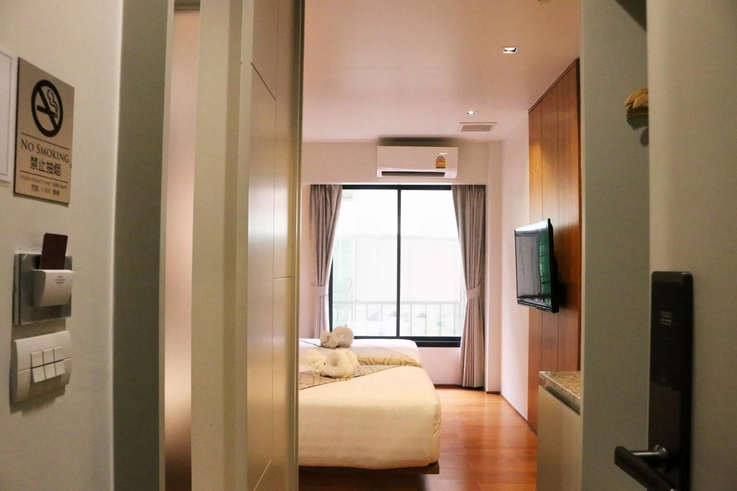 Bed in Lanna Thaphae Hotel