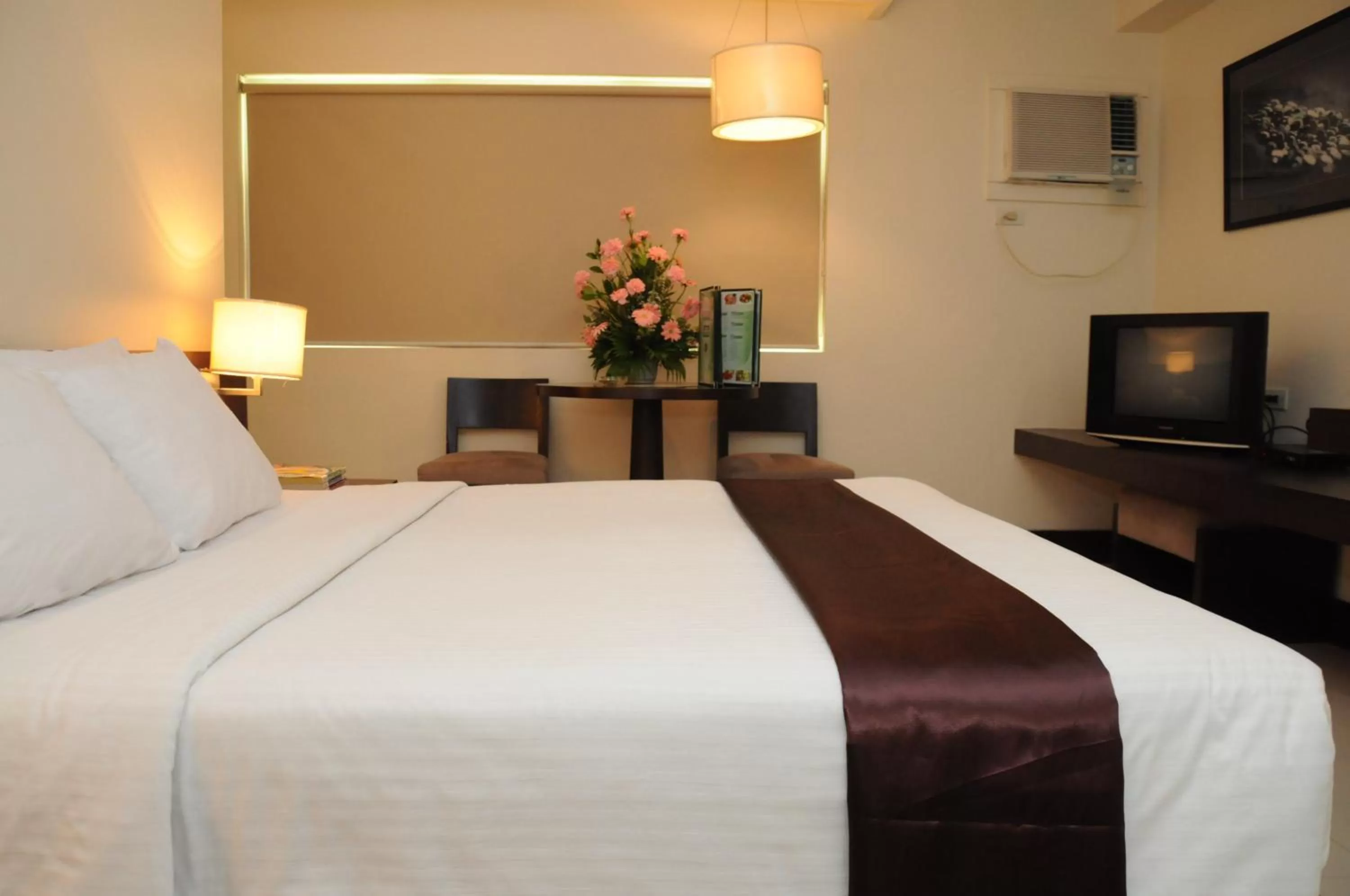 Bed in CityState Tower Hotel