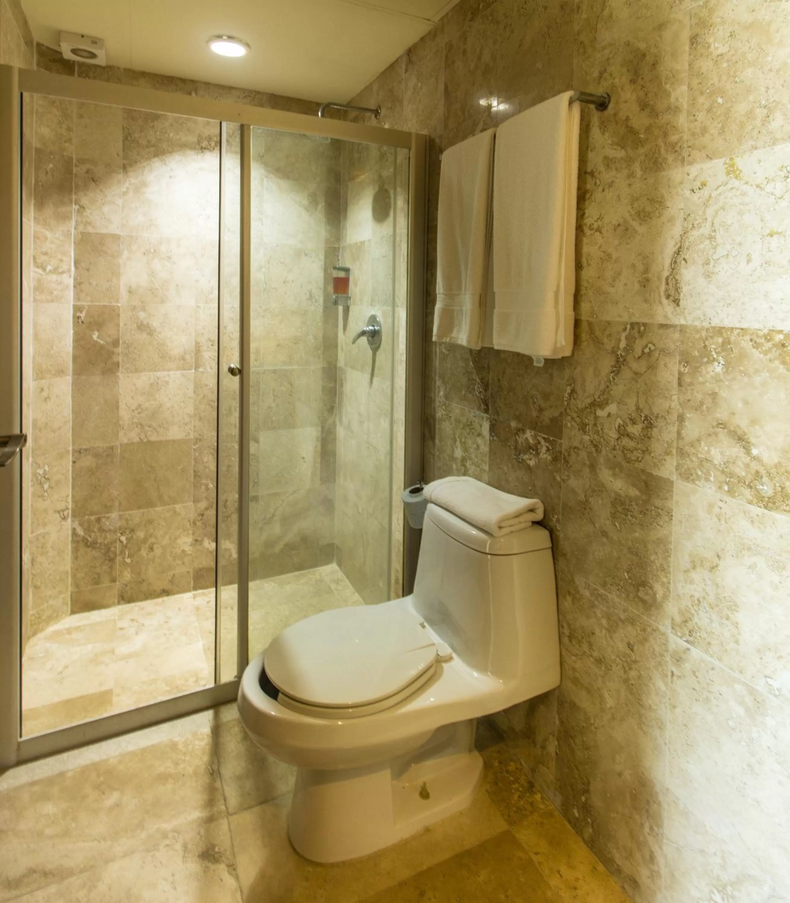 Bathroom in Coral Maya Stay Suites