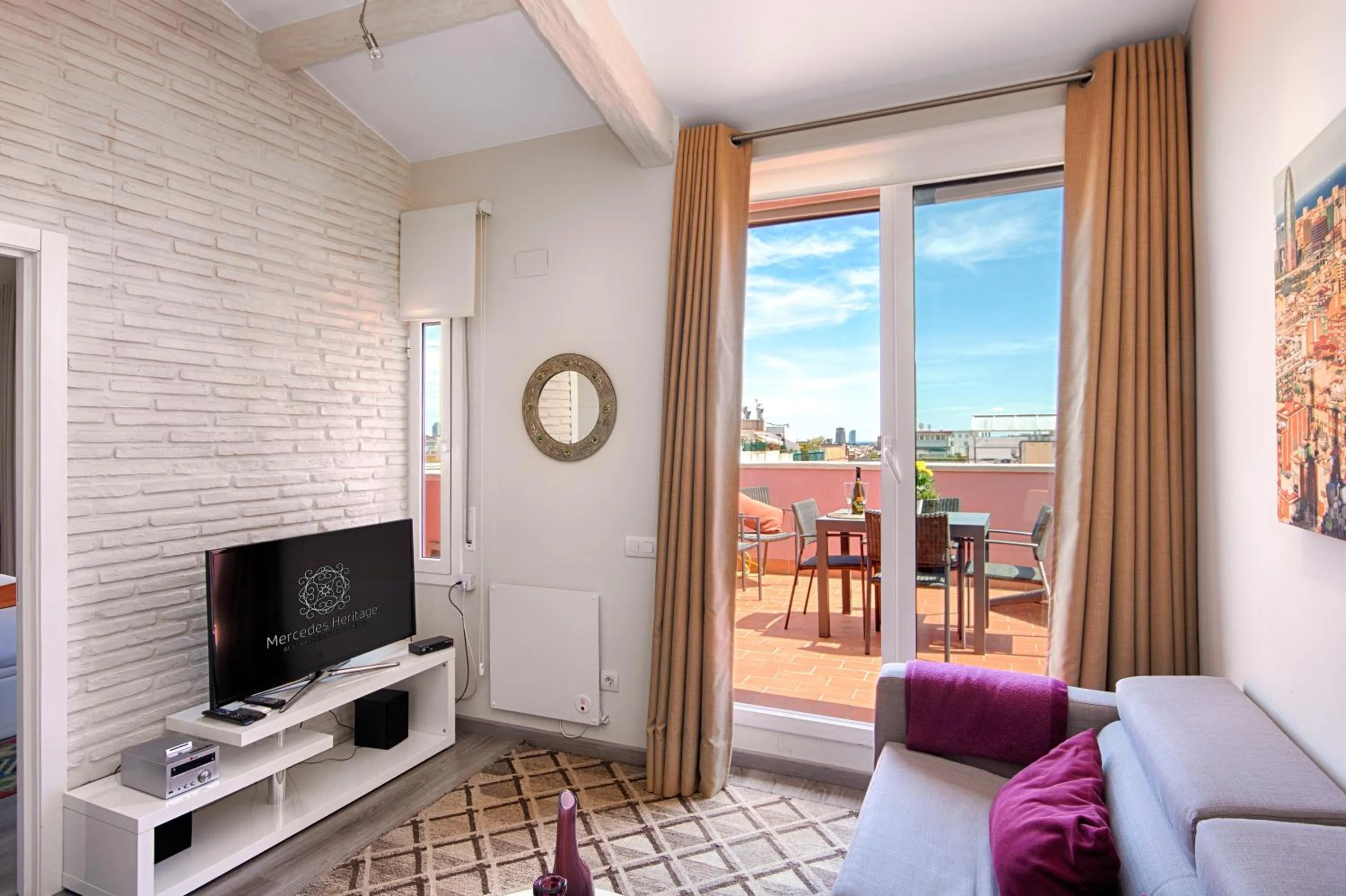 TV and multimedia in Eixample Building Apartments by Mercedes Heritage