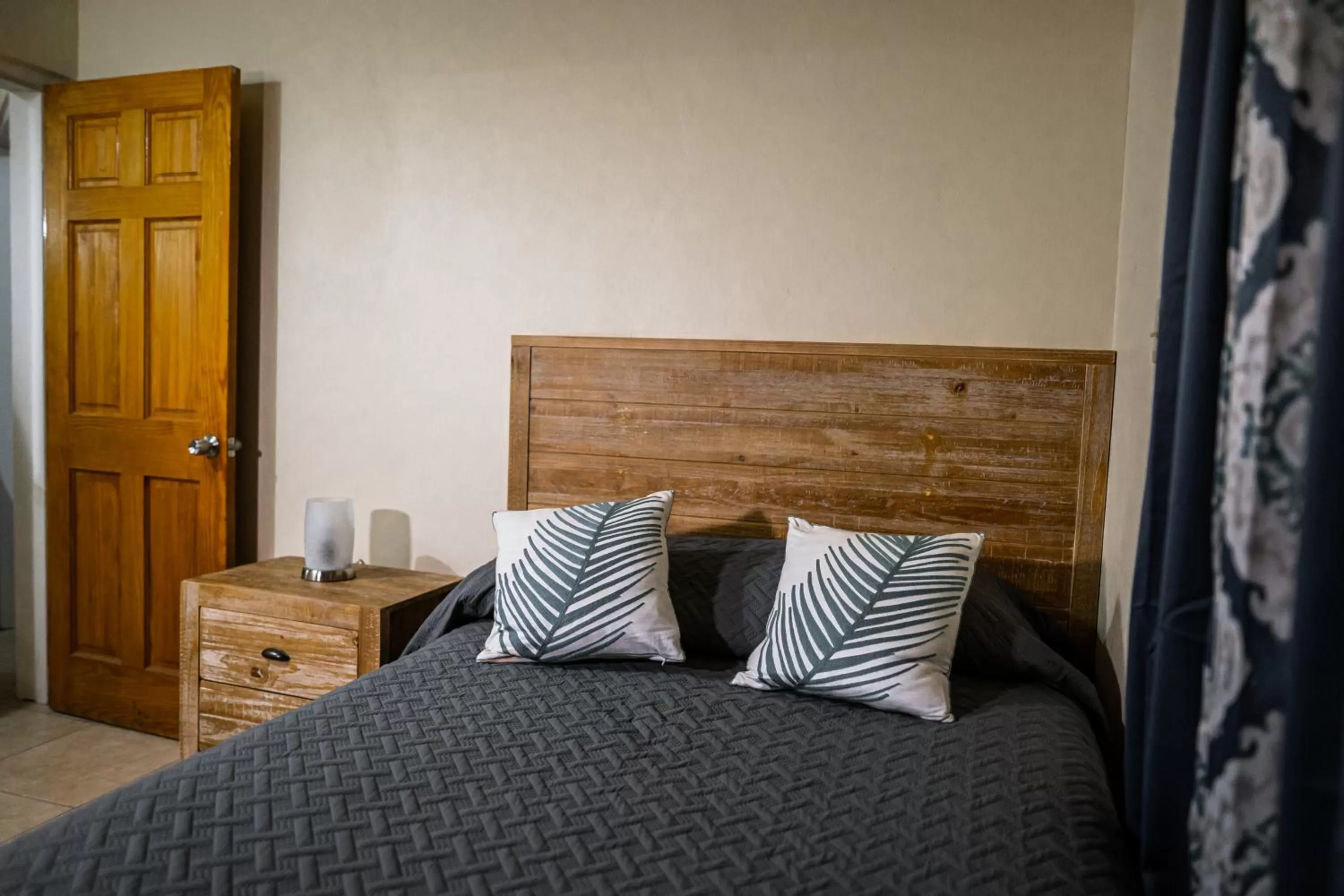 Bed in Connie's Comfort Suites