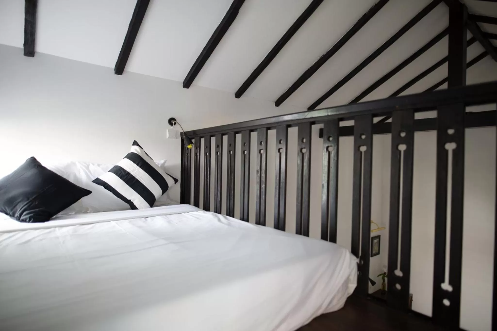 Bed in The Marian Boutique Lodging House