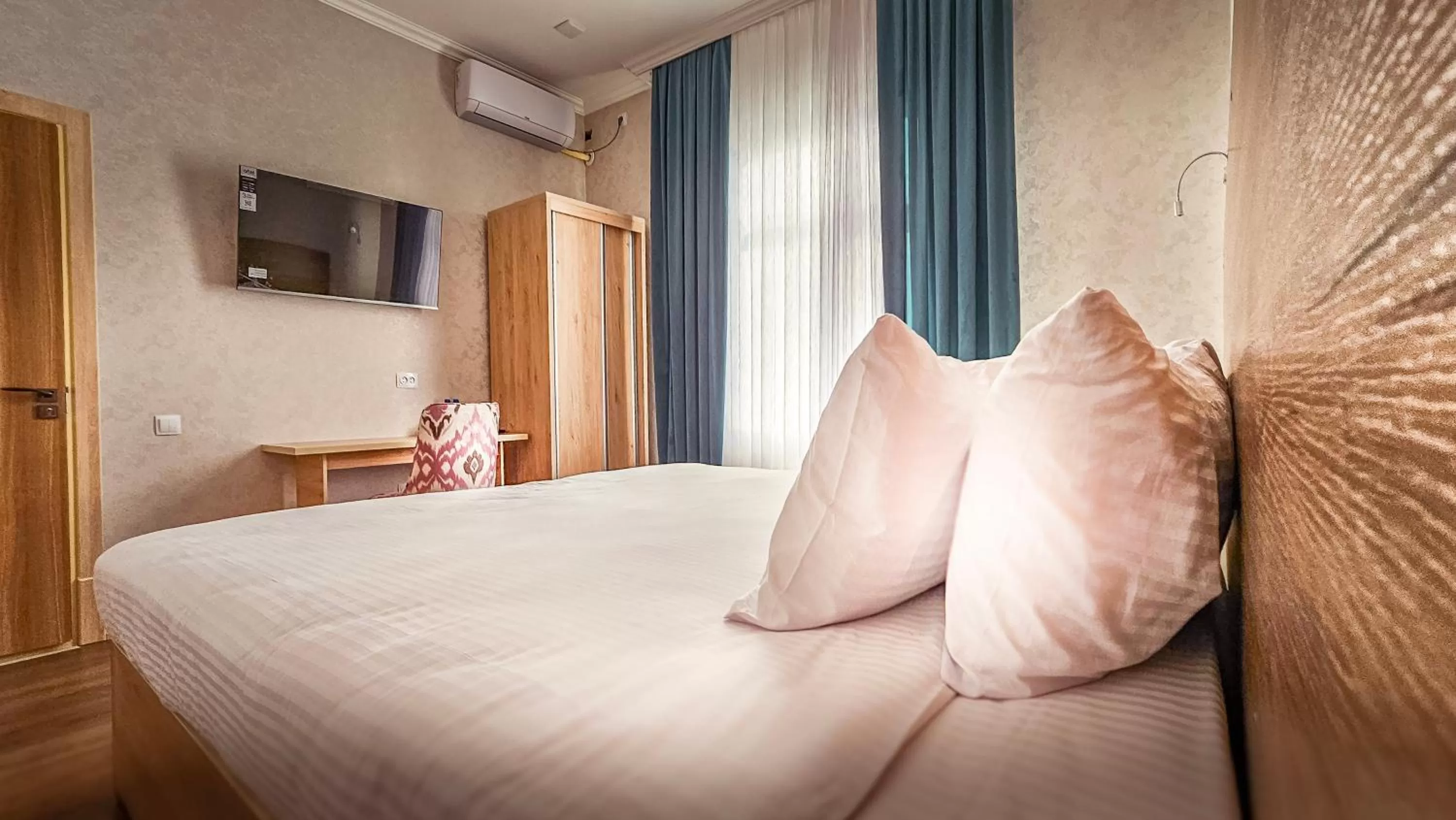 Bed in Hotel Bankir Khiva