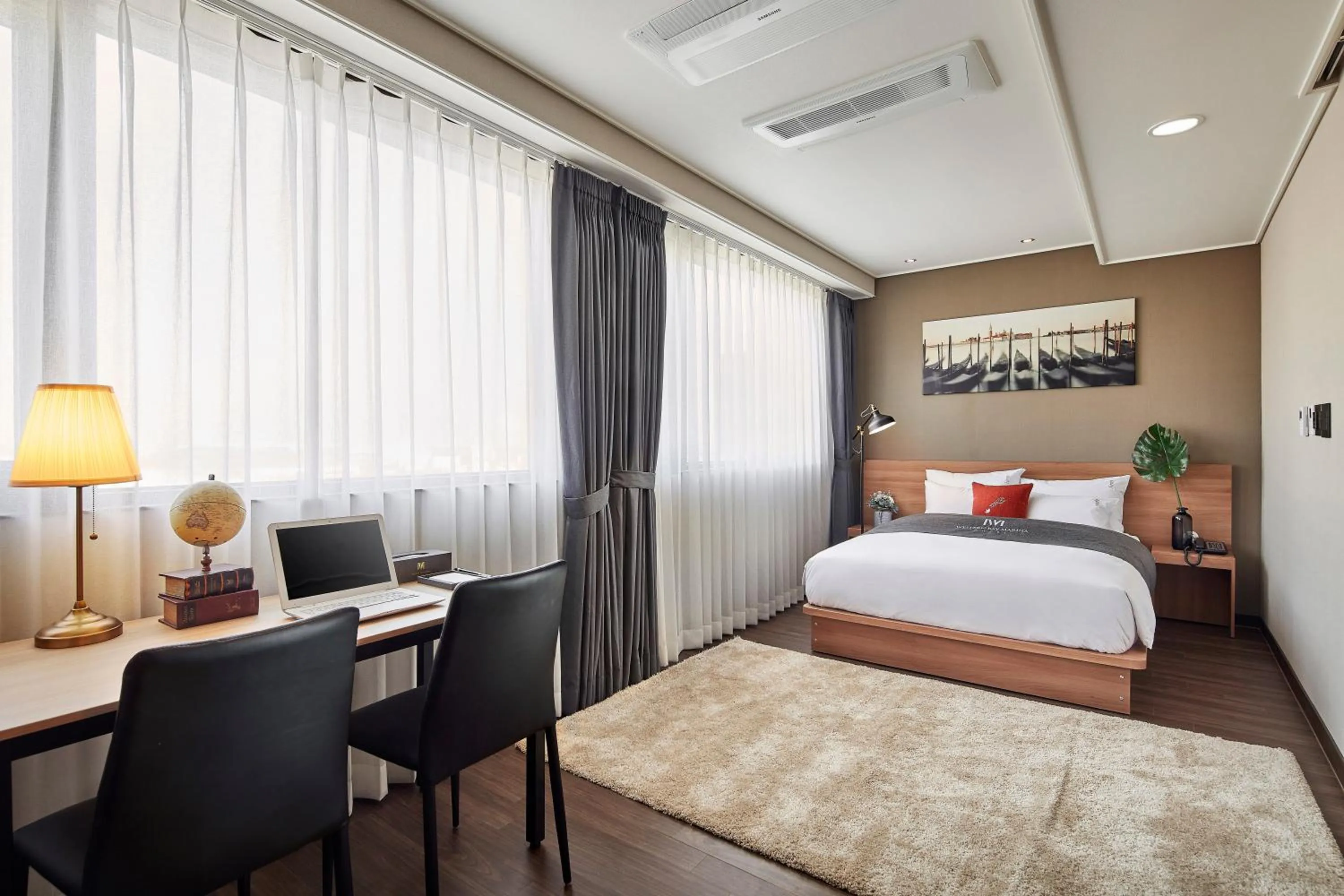 Bed in Western Bay Marina Hotel