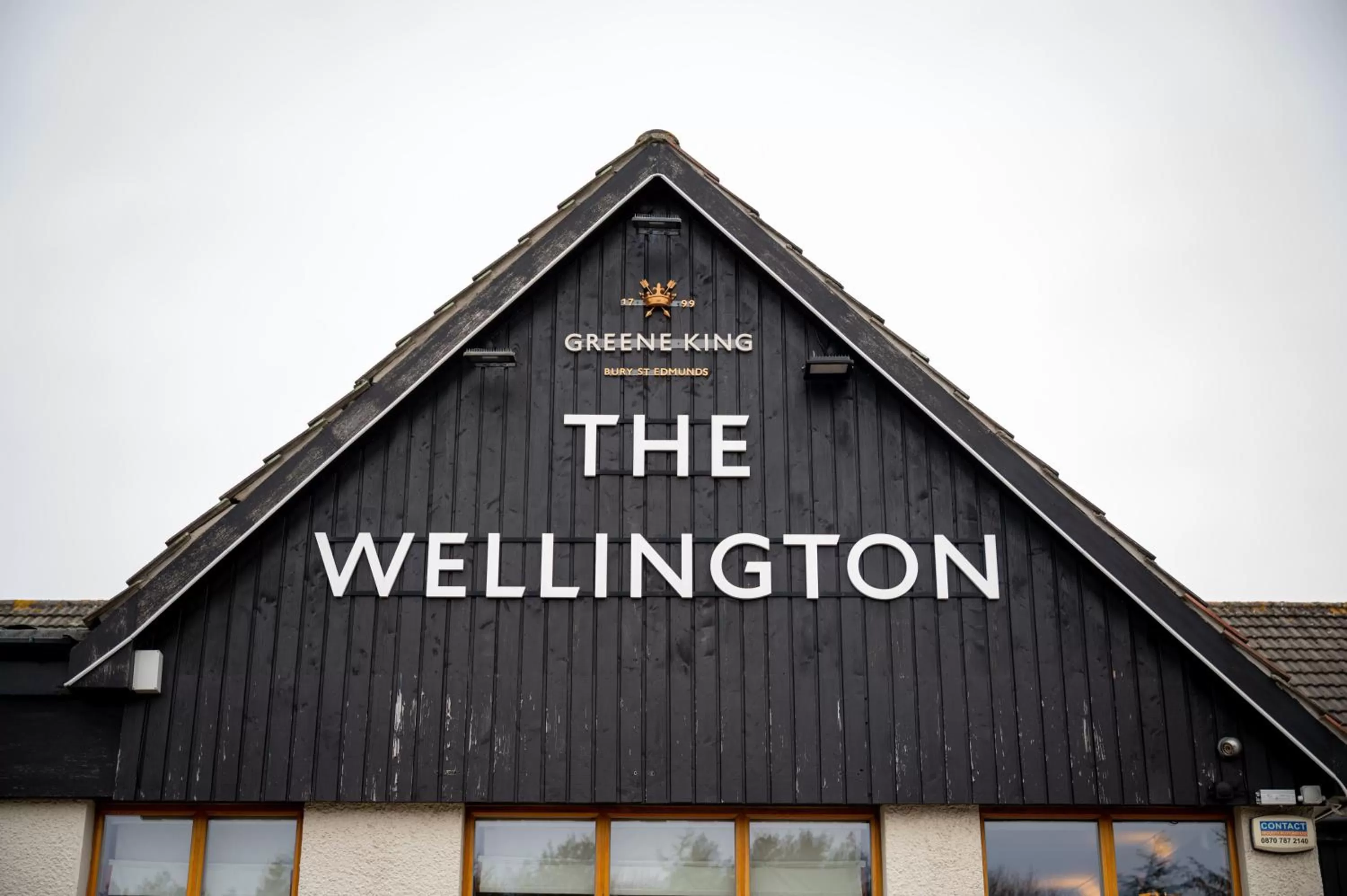 Facade/entrance in Wellington Hotel by Greene King Inns