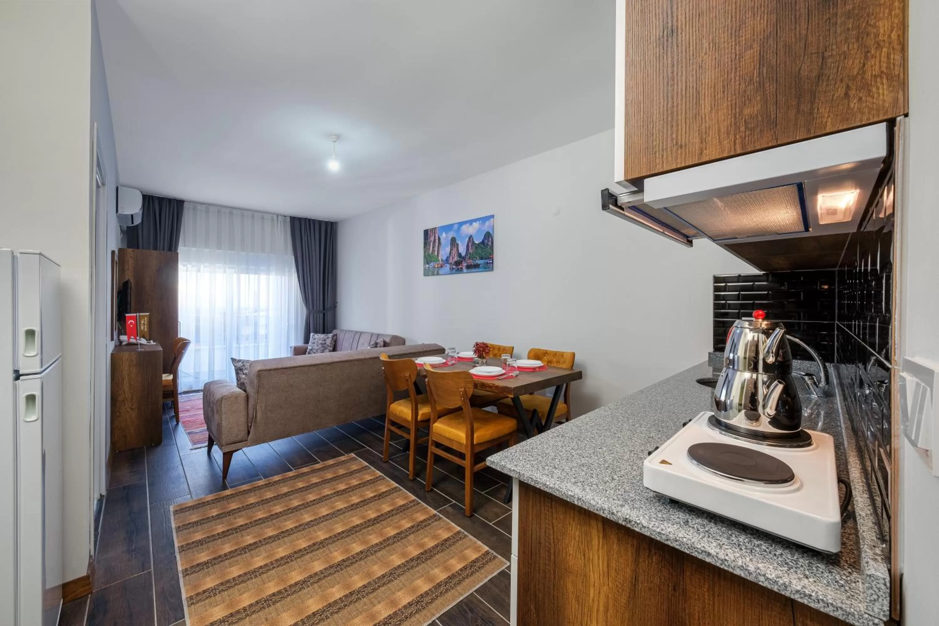 Kitchen or kitchenette, Bed in Grand Gulluk Hotel City Center Antalya