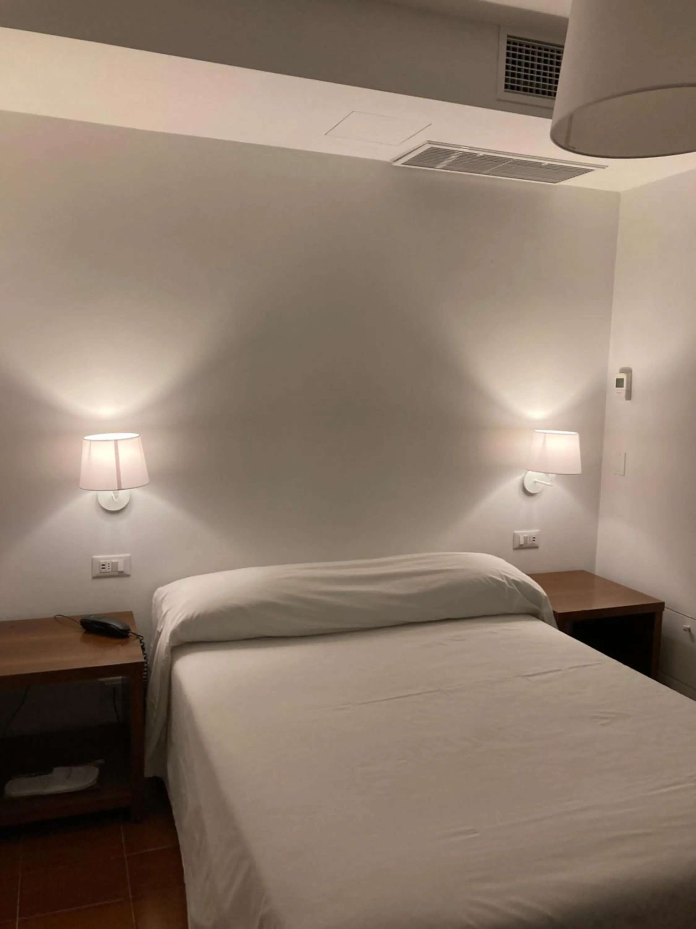 Bed in Hotel Ghironi