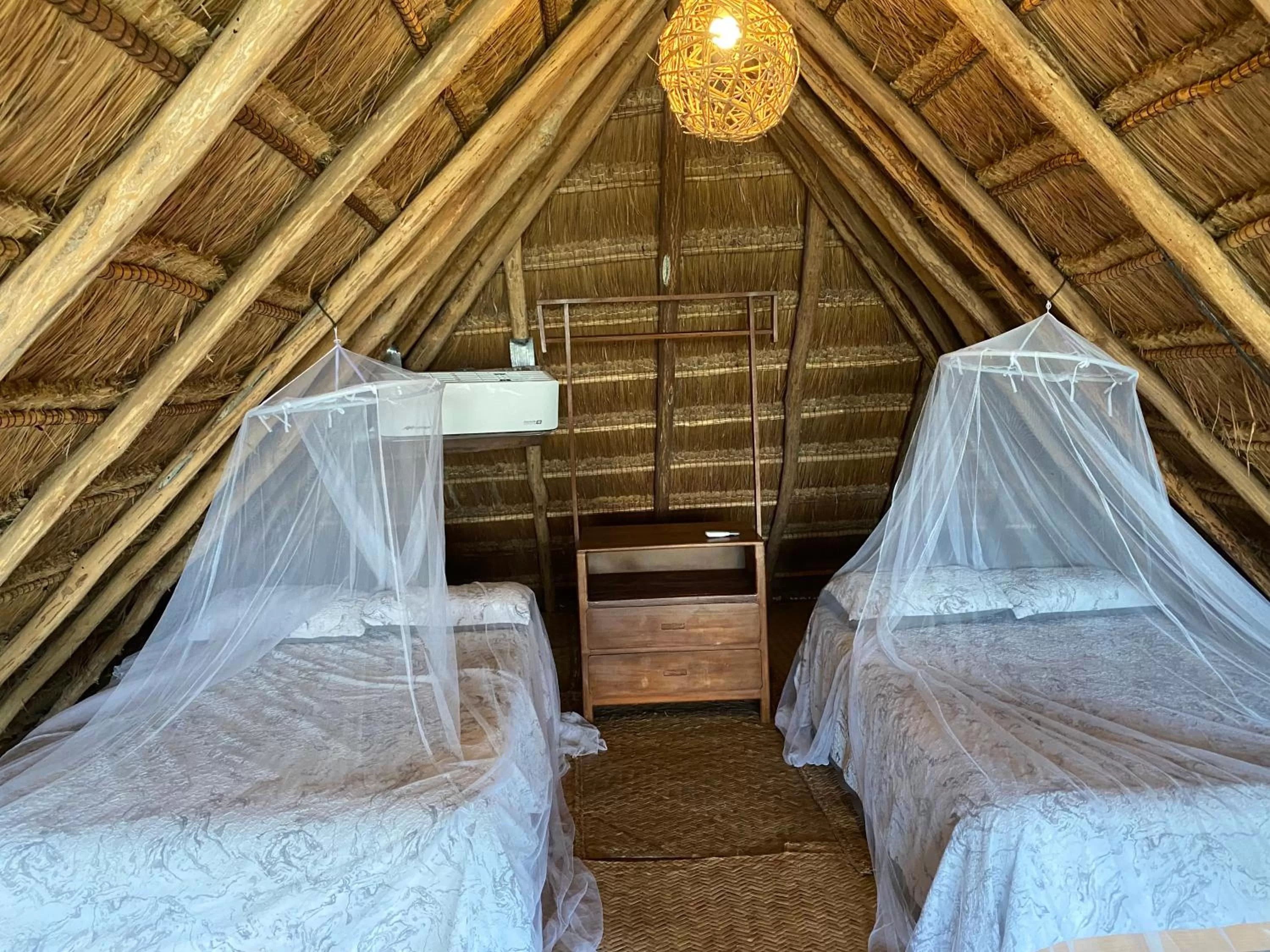 Bed in Xoot KaAna villa Amanecer